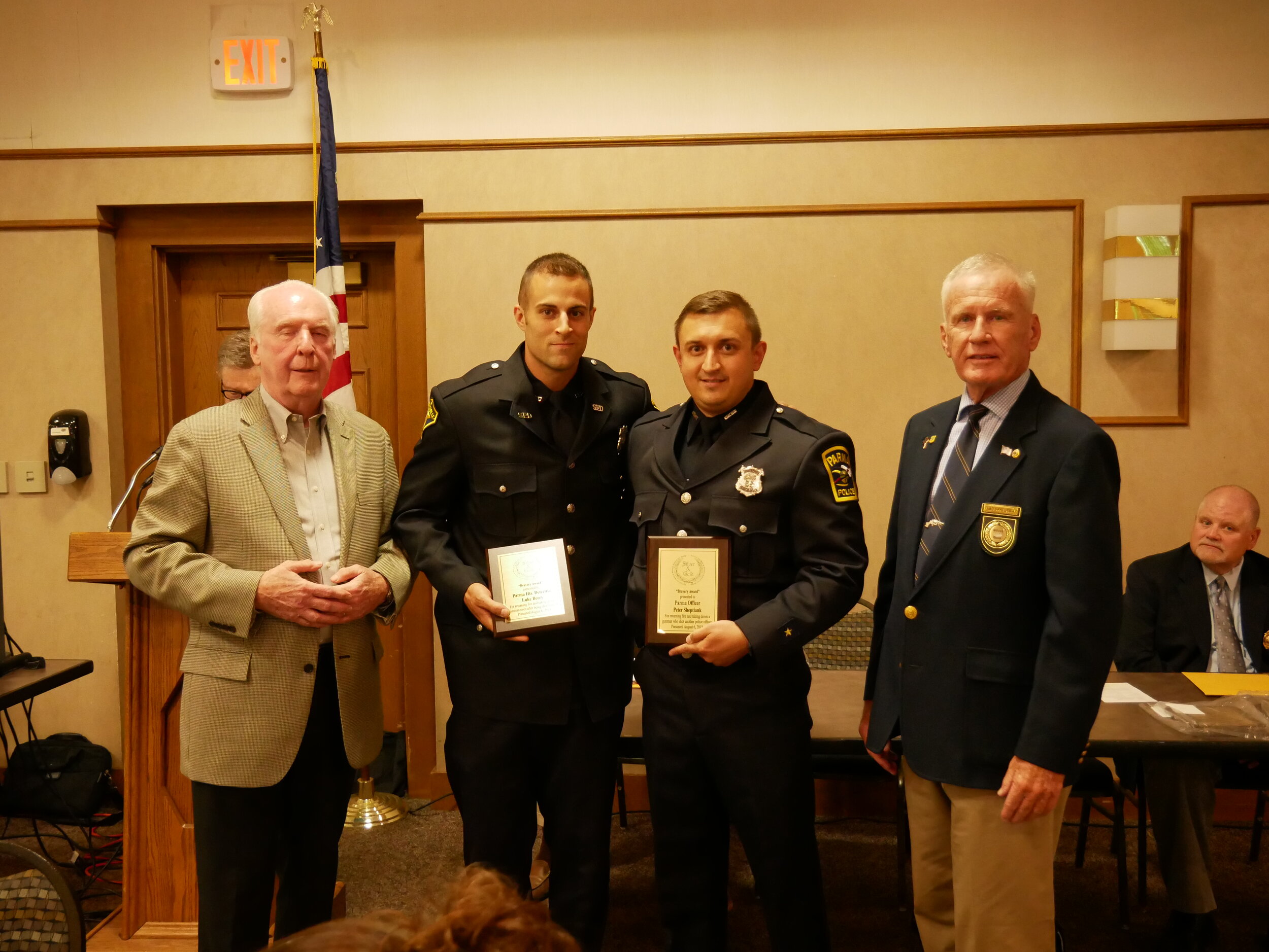 Parma Officers Luke Berry and Peter Sheptiank received the Bravery Award for returning fire and taking down a gunman who shot another police officer (Berry). 