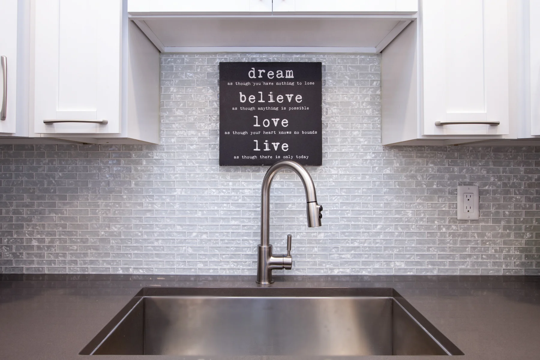 Gorgeous pearlized glass mosaic tile installed for our client in Ajax