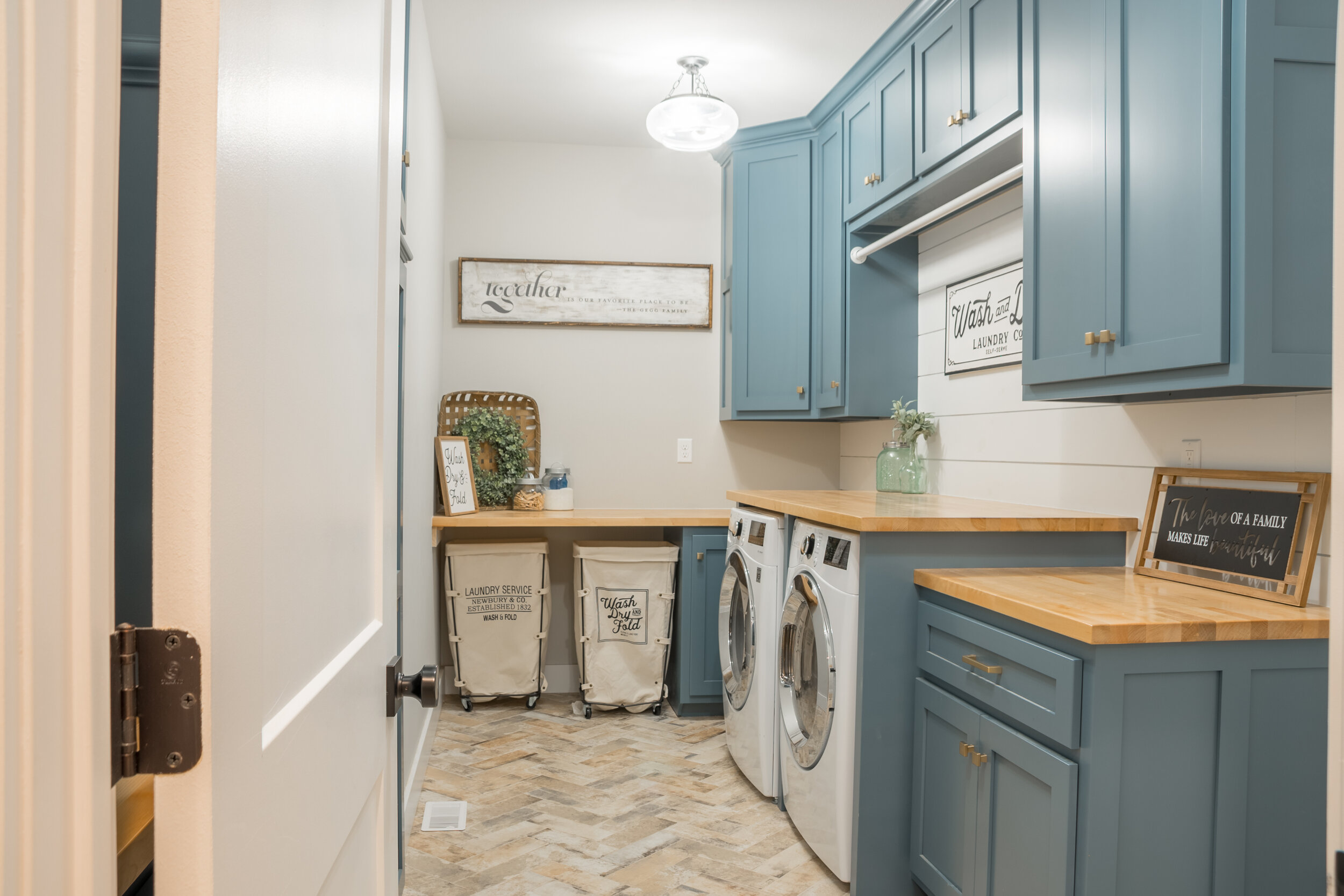 Reimagined Laundry Spaces include Custom Cabinetry