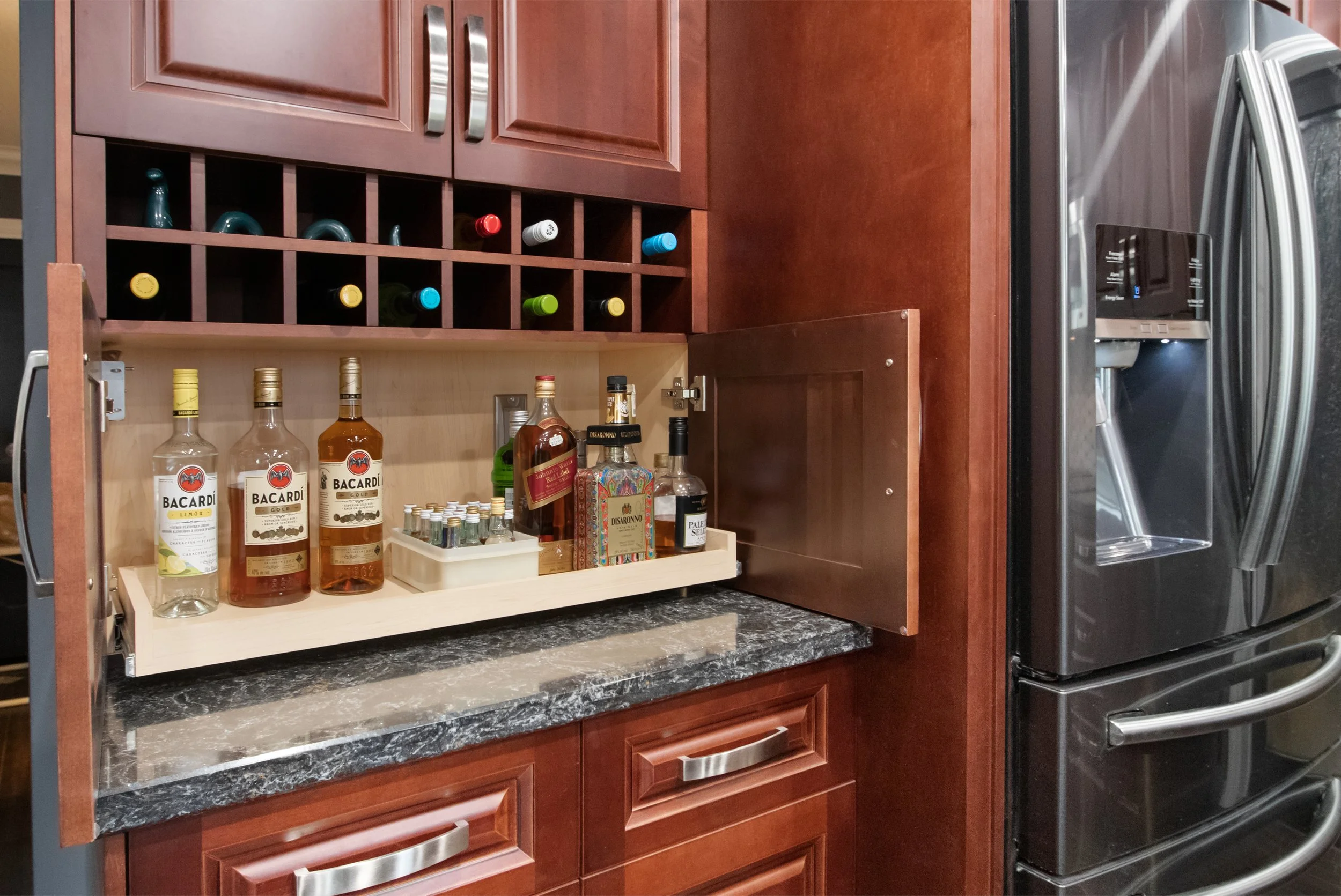hidden pull out bar in kitchen.jpg