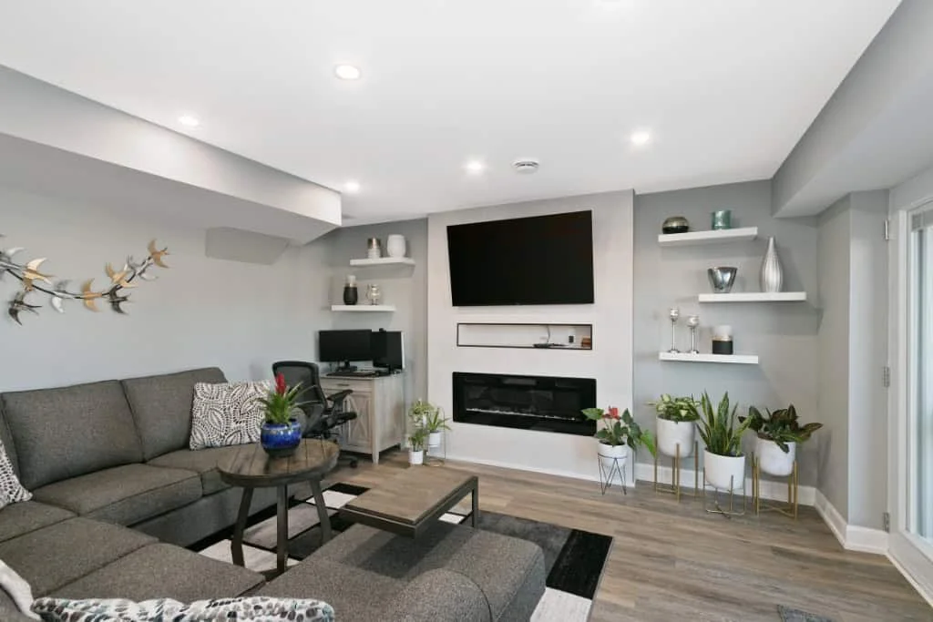 Modern finished basement renovation by Multi-Trade Building Services in Durham Region.
