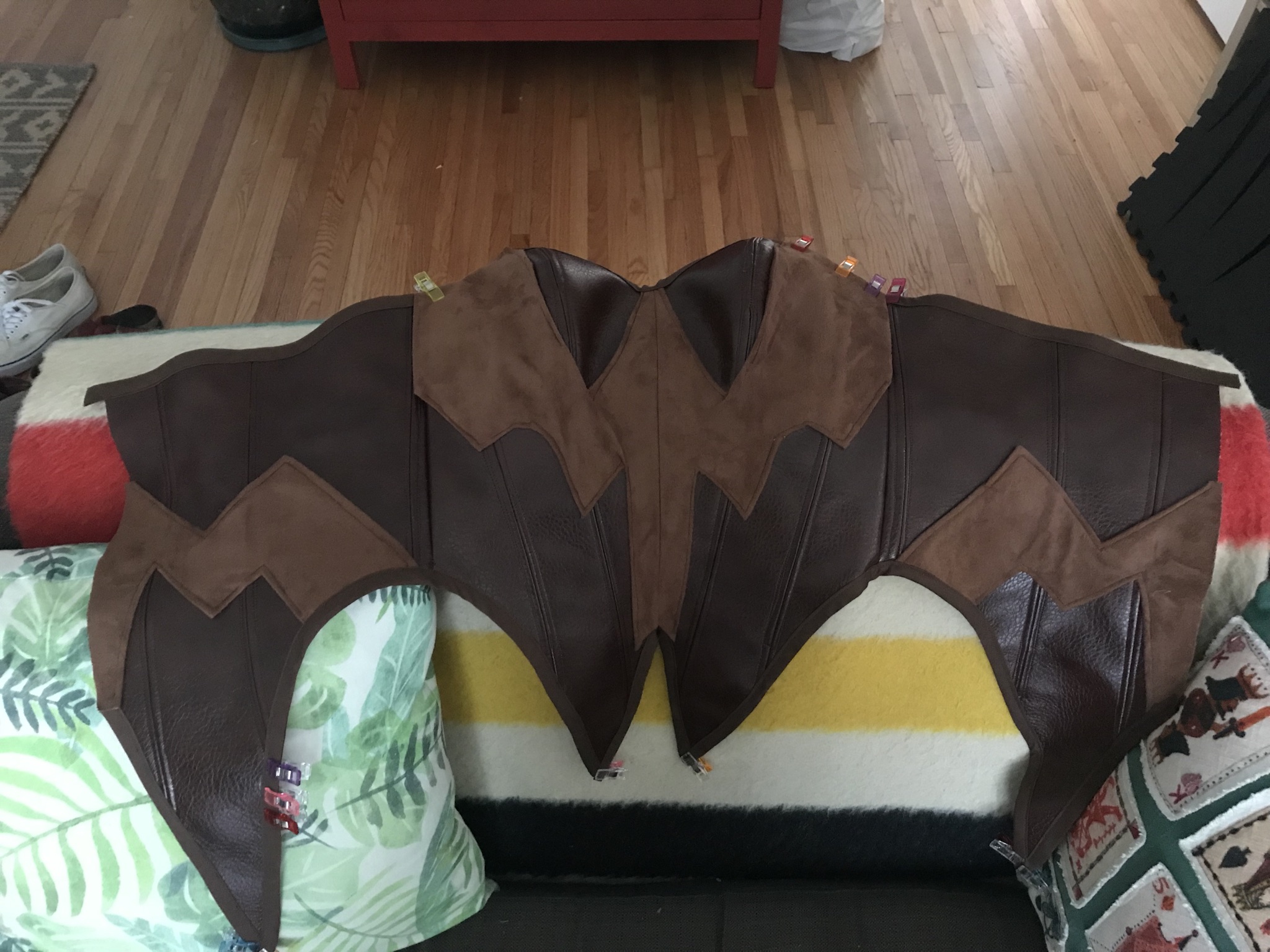 Bodice layed out with bias tape attached. The fabric I used for the pattern on top was extremely stretchy and a complete pain to try to top stitch, especially since the fabric for the rest of the bodice was super stiff.