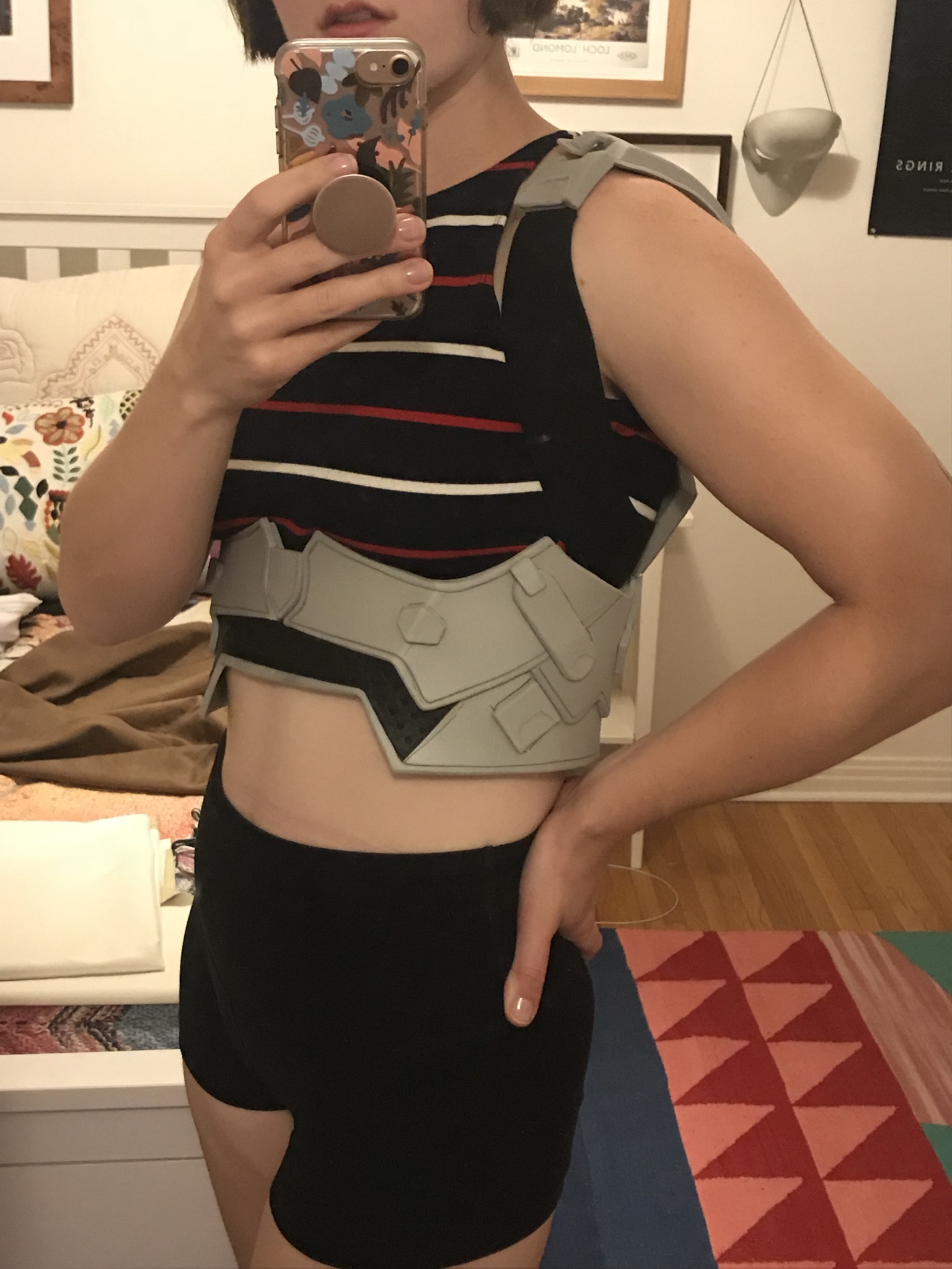 The straps have been added, but not fully secured, to allow me to put the armor on from one side. Straps are just made of thick elastic!