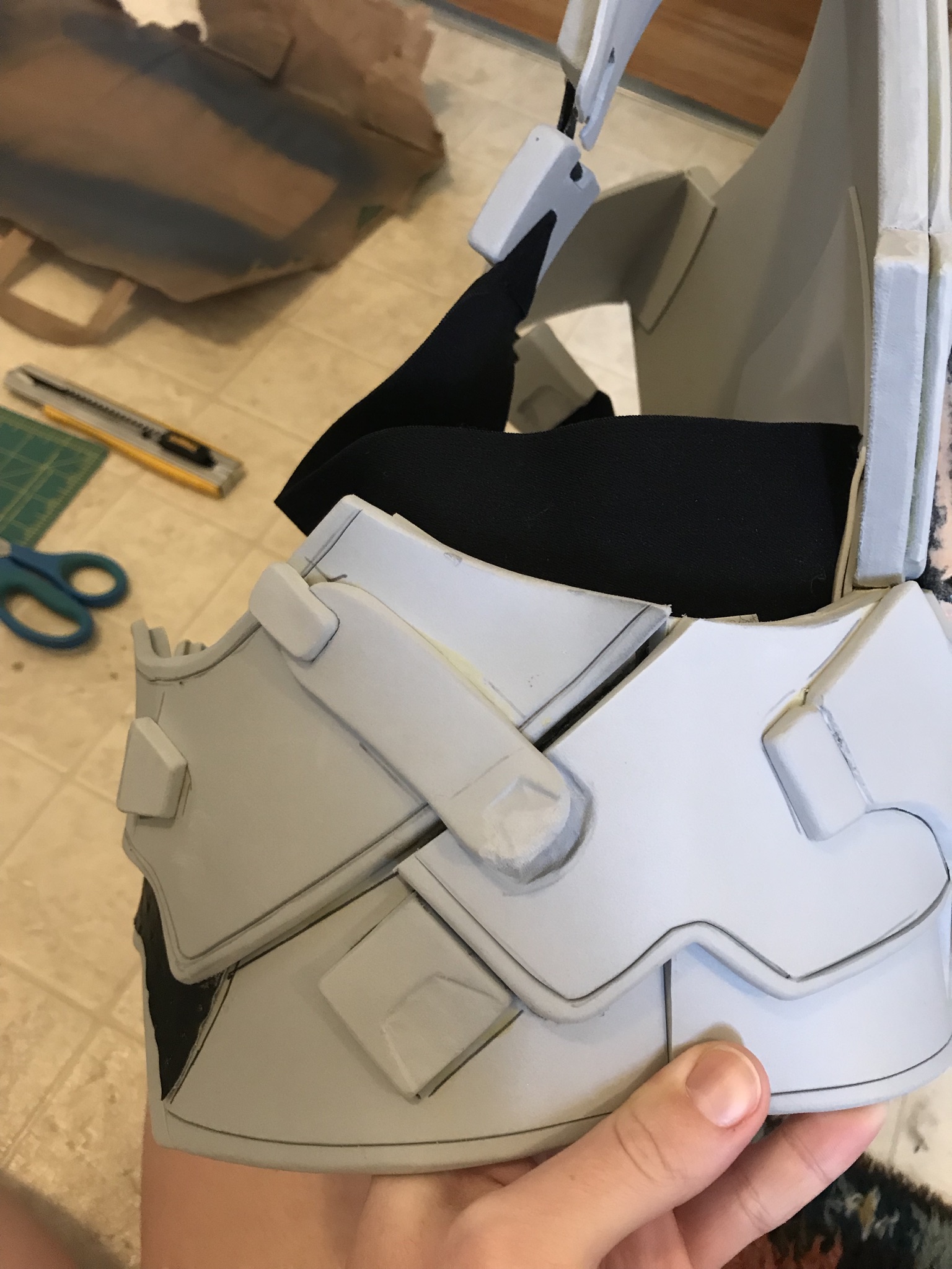 This is the side that comes apart so that I can put the armor on. Closes with velcro on the strap and foam, as well as a snap.