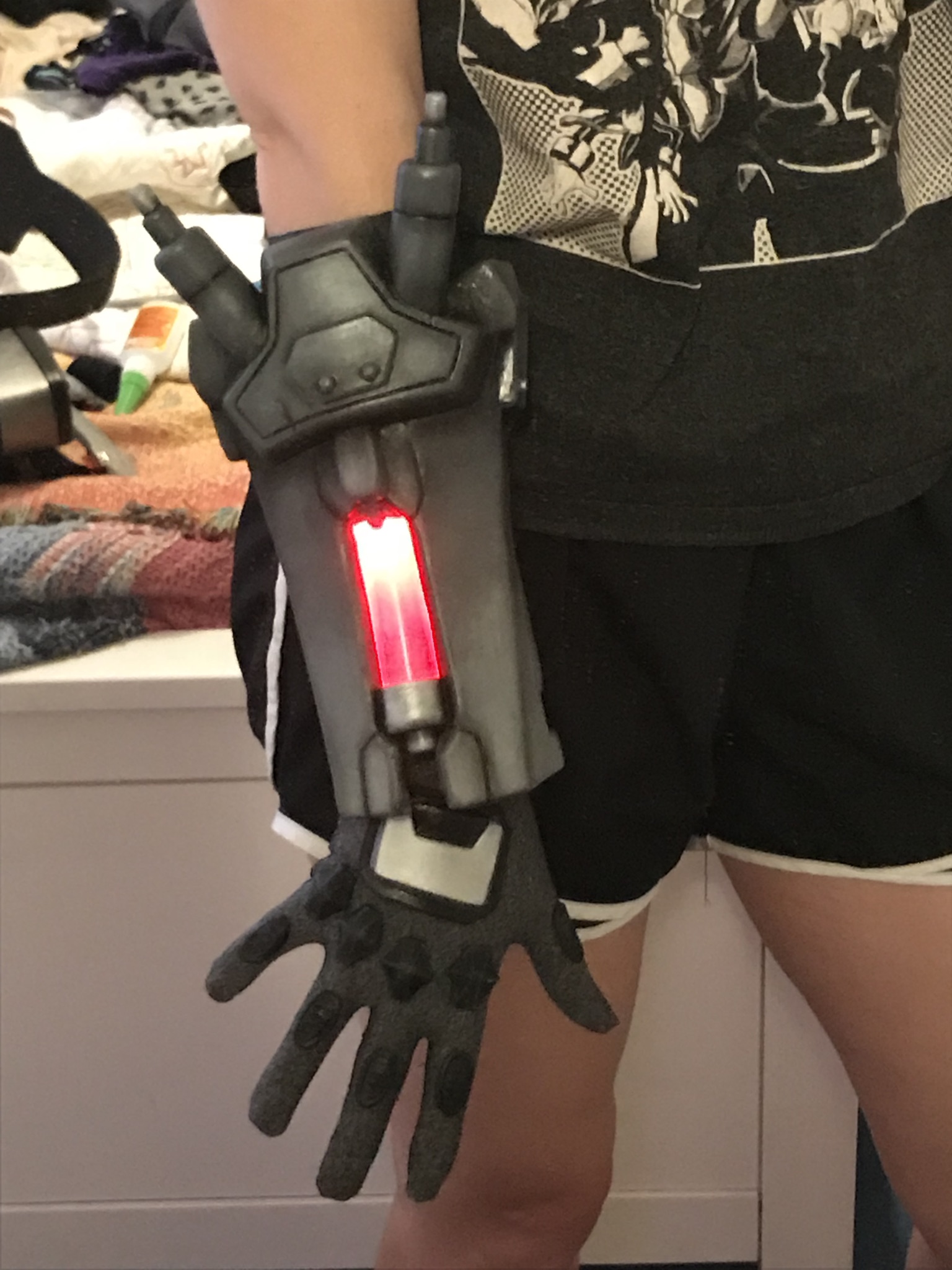 Venom mine painted and finished, with LEDs installed. I just used an acrylic tube and painted it with clear red Tamiya paint. I do wish I had fit this to fit further up on my arm, since I had issues with it staying up, but it took a long time to mak