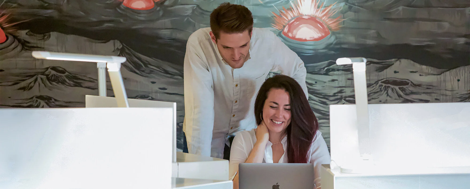Branding and Web Designers Working on Business Strategy at a Desk