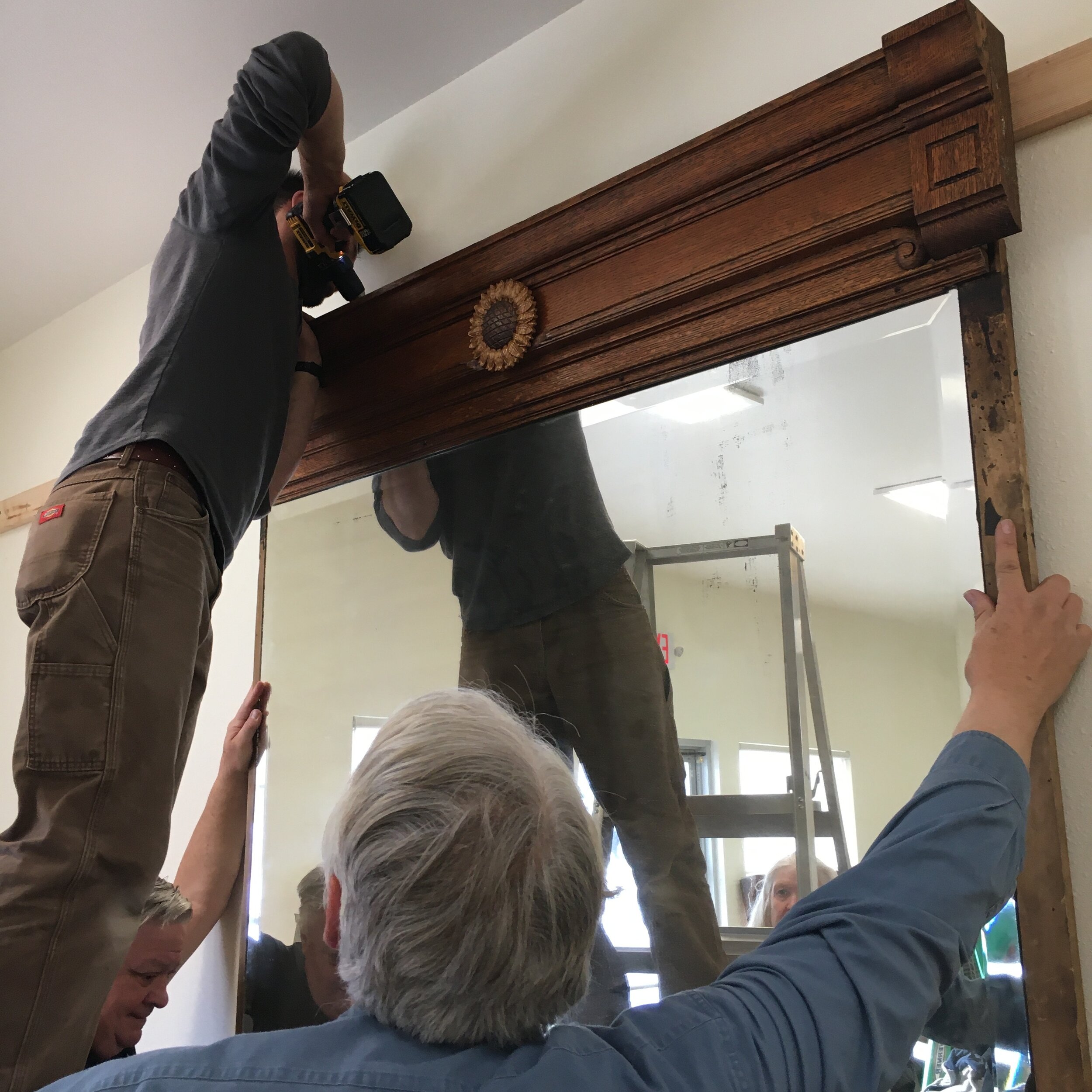 Hanging the mirror from Sweetgrass Bakery