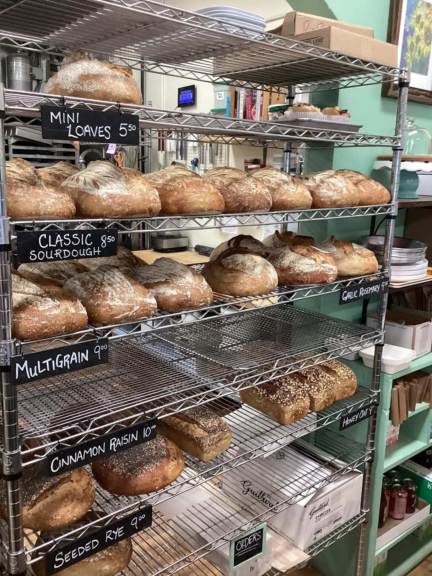 Happy Saturday! Unfortunately our masa green chili loaf has been tabled do now, but today we have garlic rosemary loaves as well as our usual cinnamon raisin bread! Come on in for a slice of quiche and our West African peanut stew :)