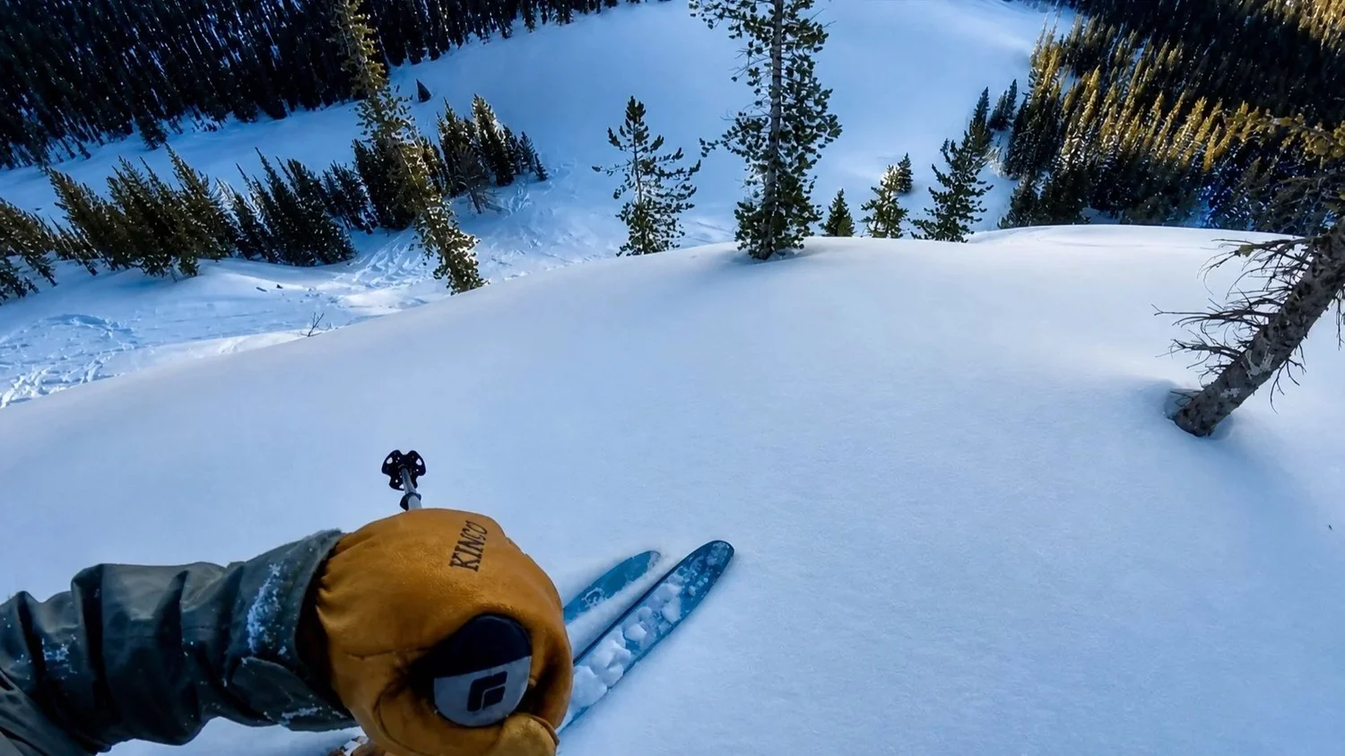 GoPro POV shot skiing Cable North — double black diamond run above Showers Lake visible from Elev8150 property, Anaconda Montana