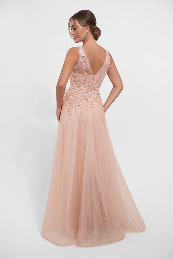 Back view of an elegant blush mother of the bride gown with a sleeveless V-back bodice, floral embroidery and beadwork, and a flowing tulle A-line skirt for weddings and formal occasions.
