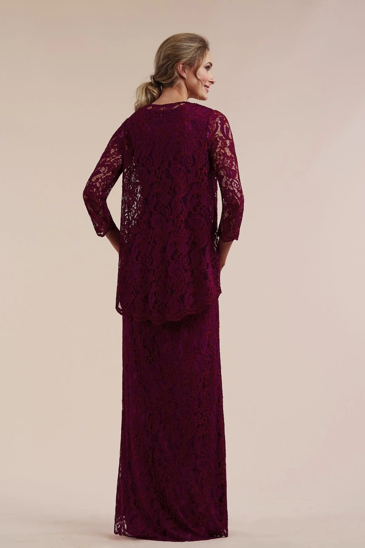 Back view of a berry mother of the bride lace column gown featuring a coordinating three-quarter sleeve lace jacket and elegant floor-length silhouette for formal occasions.
