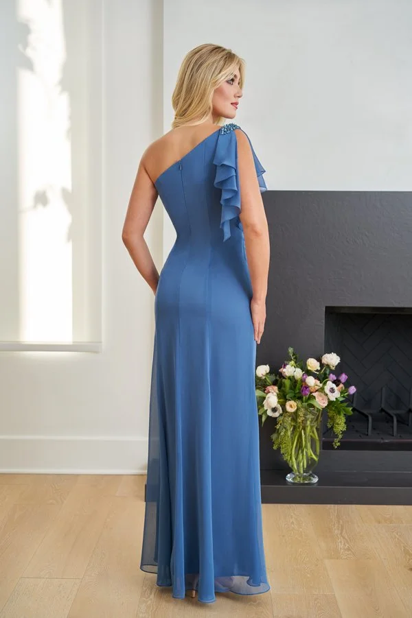 Back view of a cornflower blue mother of the bride gown with a one-shoulder neckline, cascading chiffon ruffle sleeve, crystal shoulder embellishment, and a graceful floor-length silhouette.