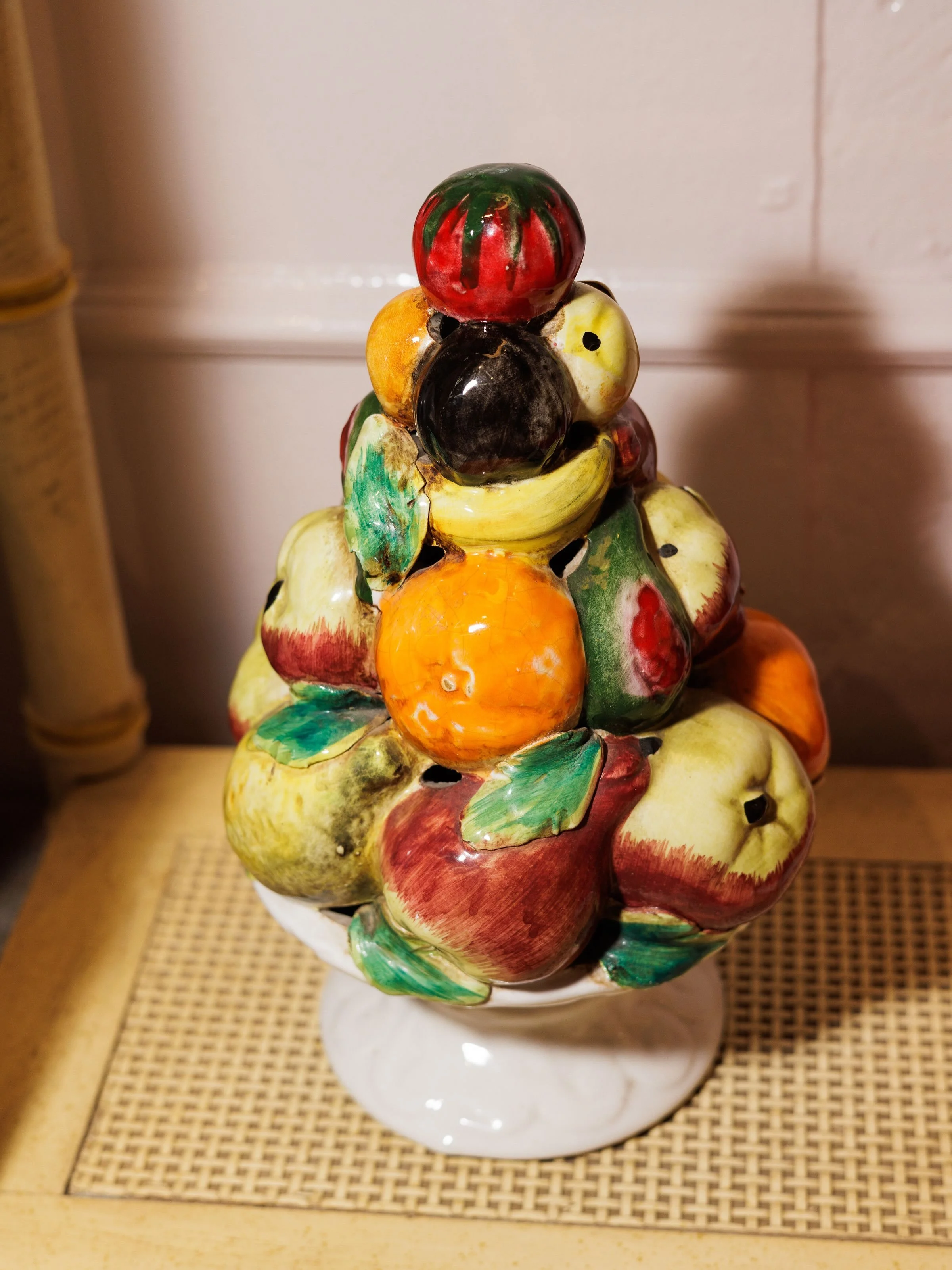 Fruity! 🍊🍐🍎🍋🥭🍌
The Vintage Hand-Painted Italian Majolica Fruit Topiary

Italian majolica fruit topiaries trace their roots back to the Italian Renaissance, when ceramic artisans perfected tin-glazed earthenware&mdash;known as maiolica&mdash;to 