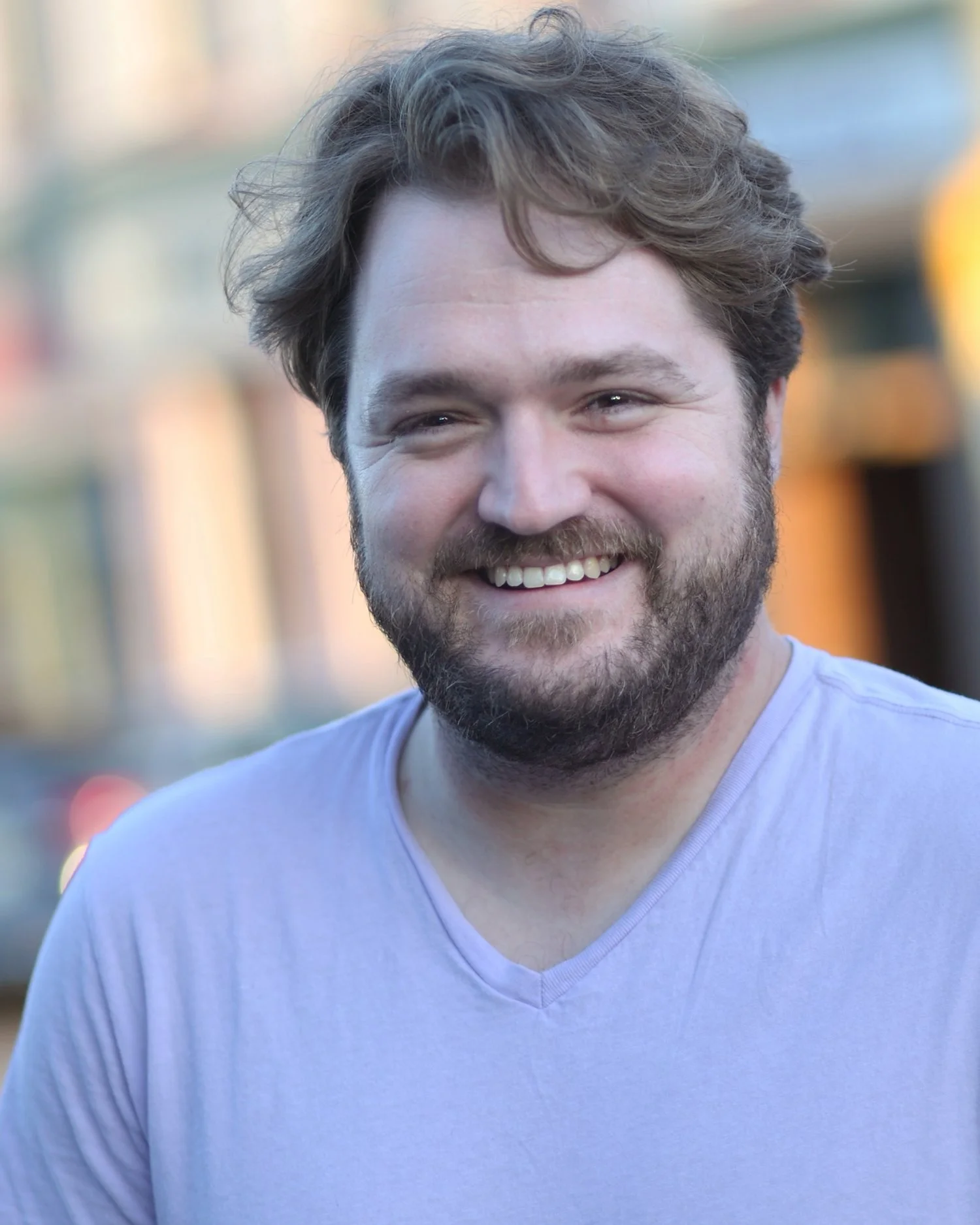 Anthony Reynolds, adorably chortling outside our offices on Baraga Avenue. Photo by Alastar Dimitrie.
