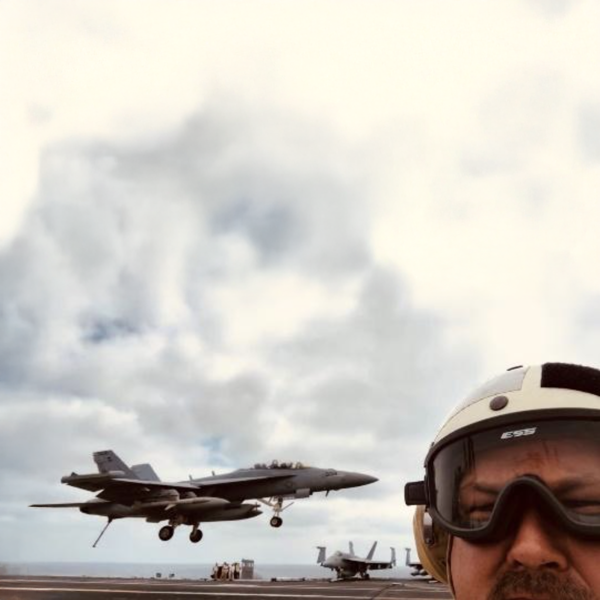 Image of man and fighter jet