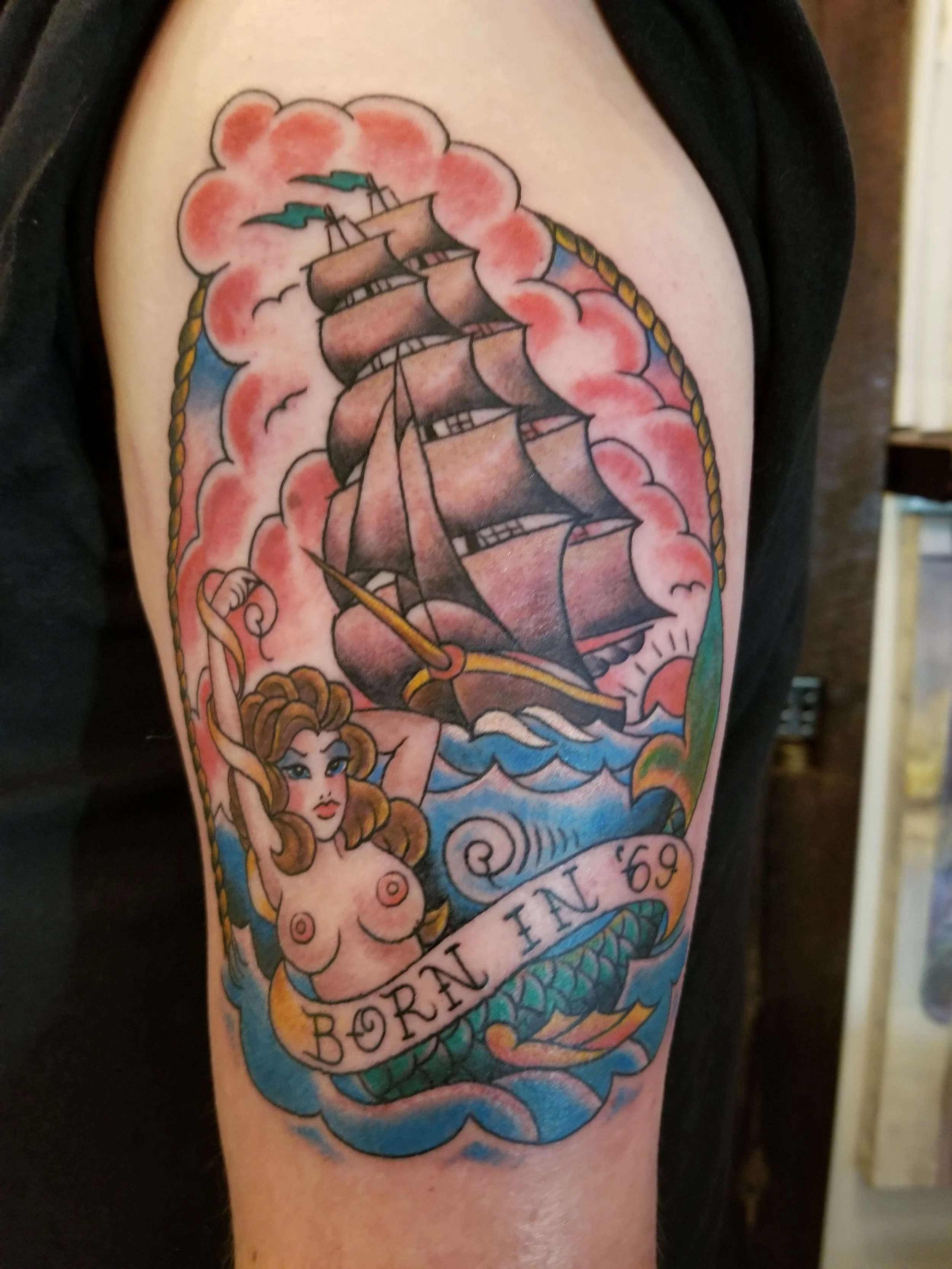 Ship and mermaid