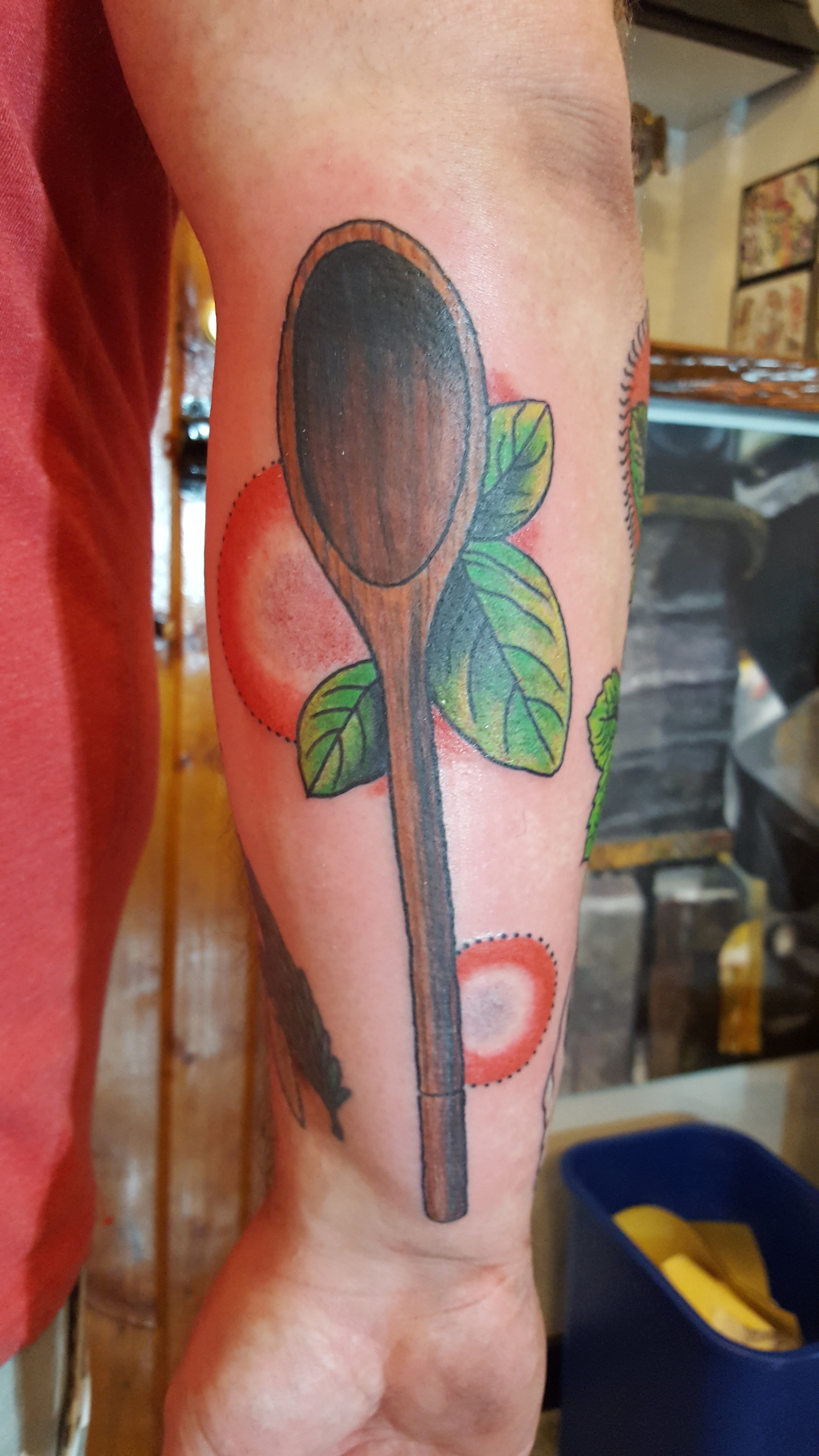 Wooden spoon and basil