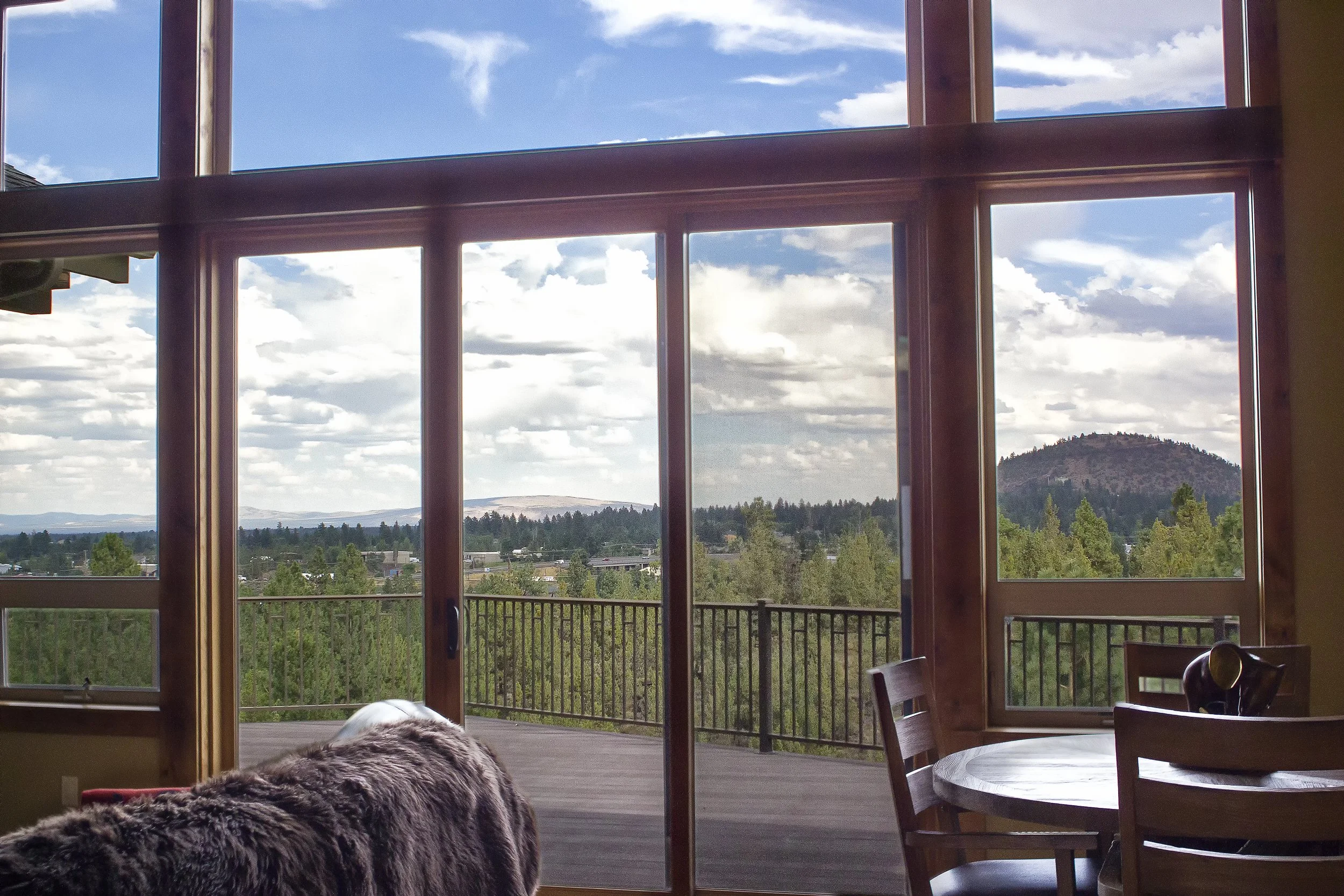 the view outside of a bend living room overlooking bend oregon