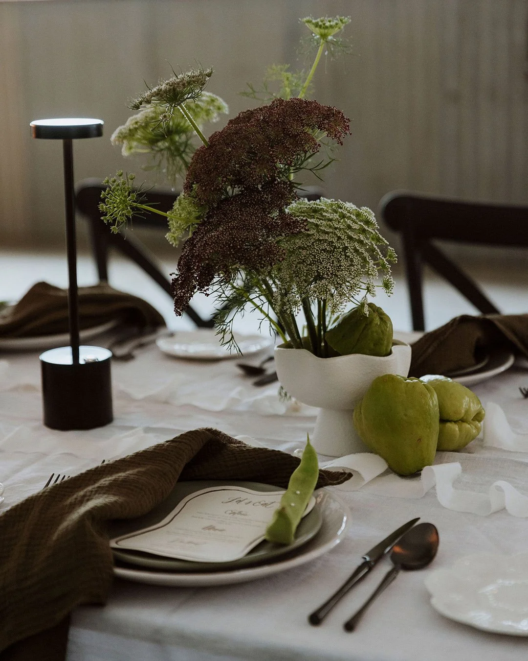 non-traditional-black-white-green-wedding-tablesetting.jpg