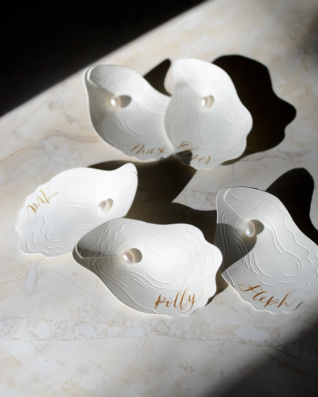 sculptural-3d-oyster-placecard-gold-calligraphy-melbourne.jpg