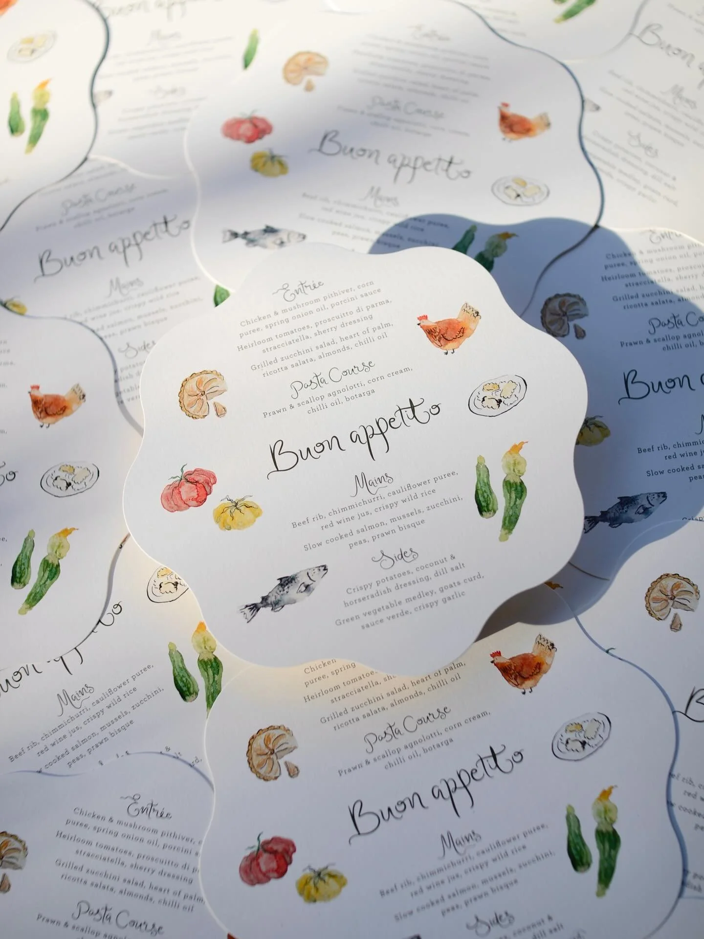 Come for the wedding, stay for the mouth watering menu! 🍅🐓🌽🐟

Created for Lauren &amp; Tom&rsquo;s upcoming Yarra Valley winery wedding, this circular menu features a soft, wavy die-cut edge, a subtle nod to the iconic, symmetrical slope of the v