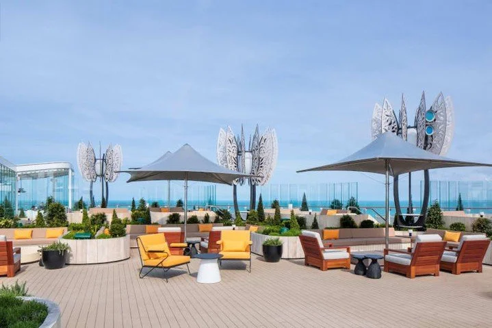 🌿✨ Welcome to the Rooftop Garden aboard the Celebrity Beyond! This luxurious outdoor oasis is the perfect place to unwind with refreshing drinks while enjoying stunning views and vibrant outdoor entertainment. 🍹🌞

Ready to elevate your cruise expe