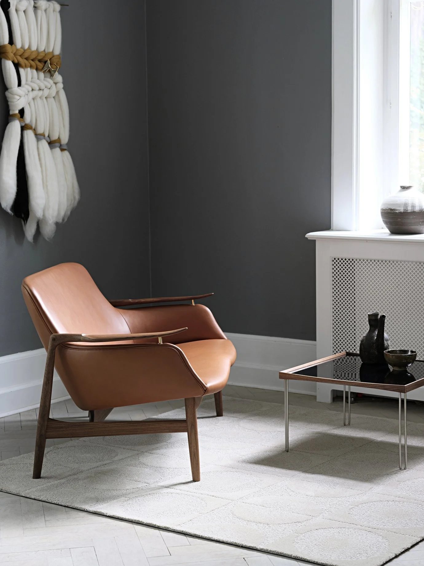 The 53 Sofa_Vegetal 95_Leather_Walnut_The Undyed Circle Rug_Sandstone_The Tray Table_Black High Gloss Laminate_Walnut.jpg