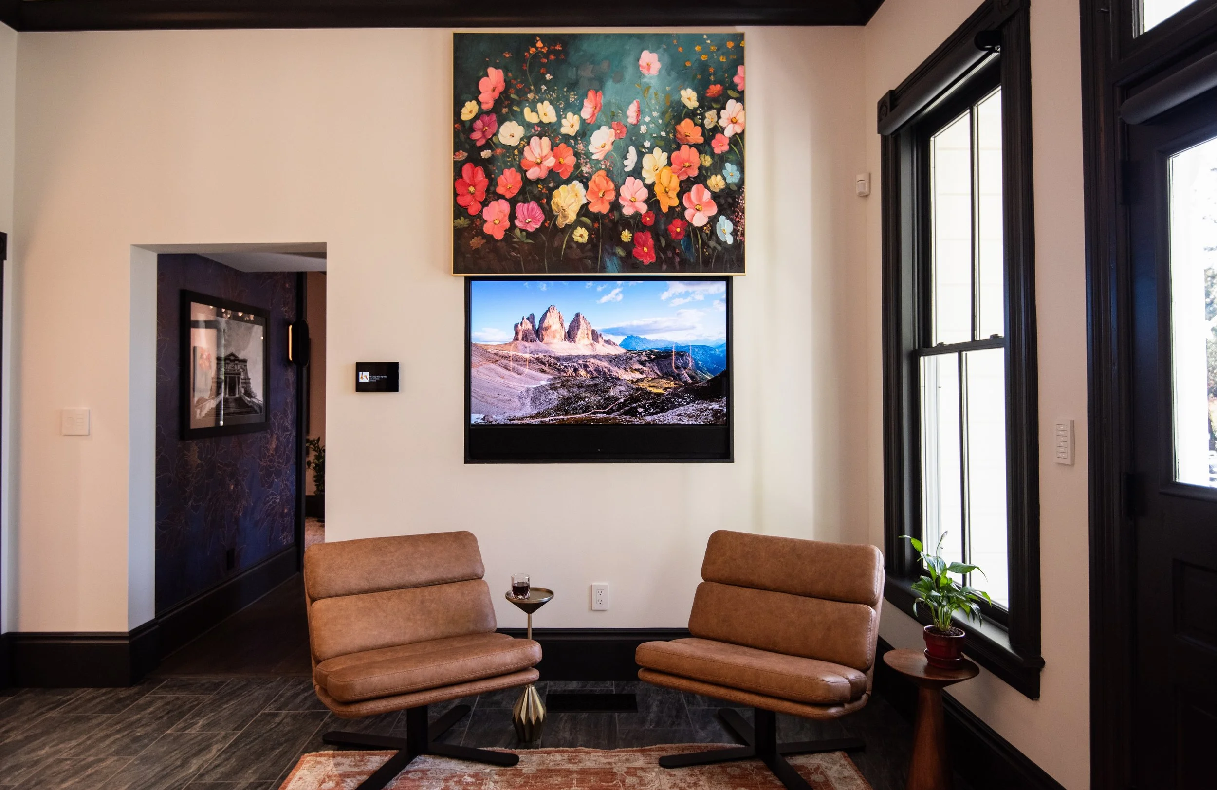  Revealing the TV underneath at the press of a button, Leon’s Illusion Moving Art Lift maximizes both the form and function of a small wall area. 