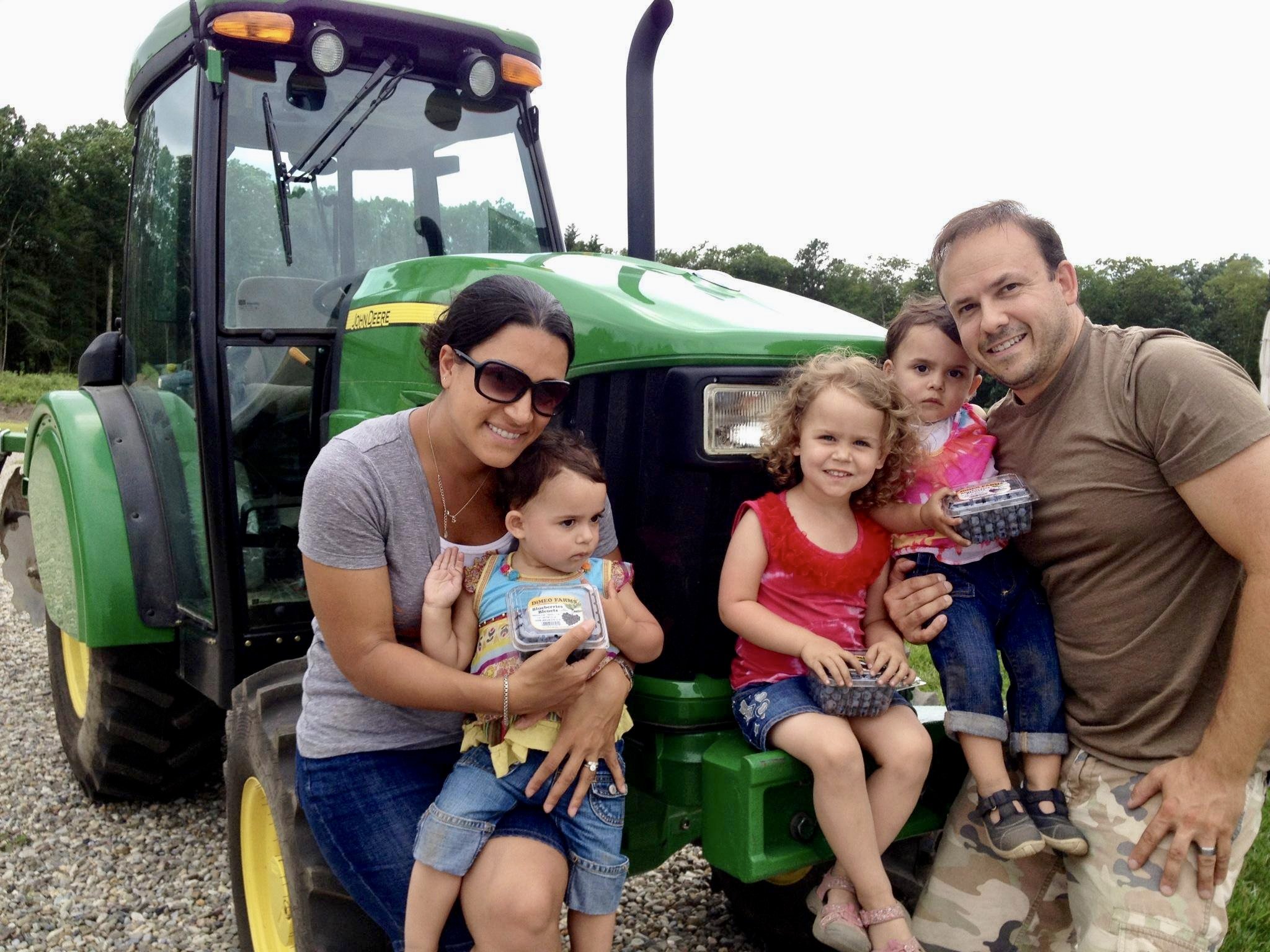 Customers with John Deere tractor.jpeg