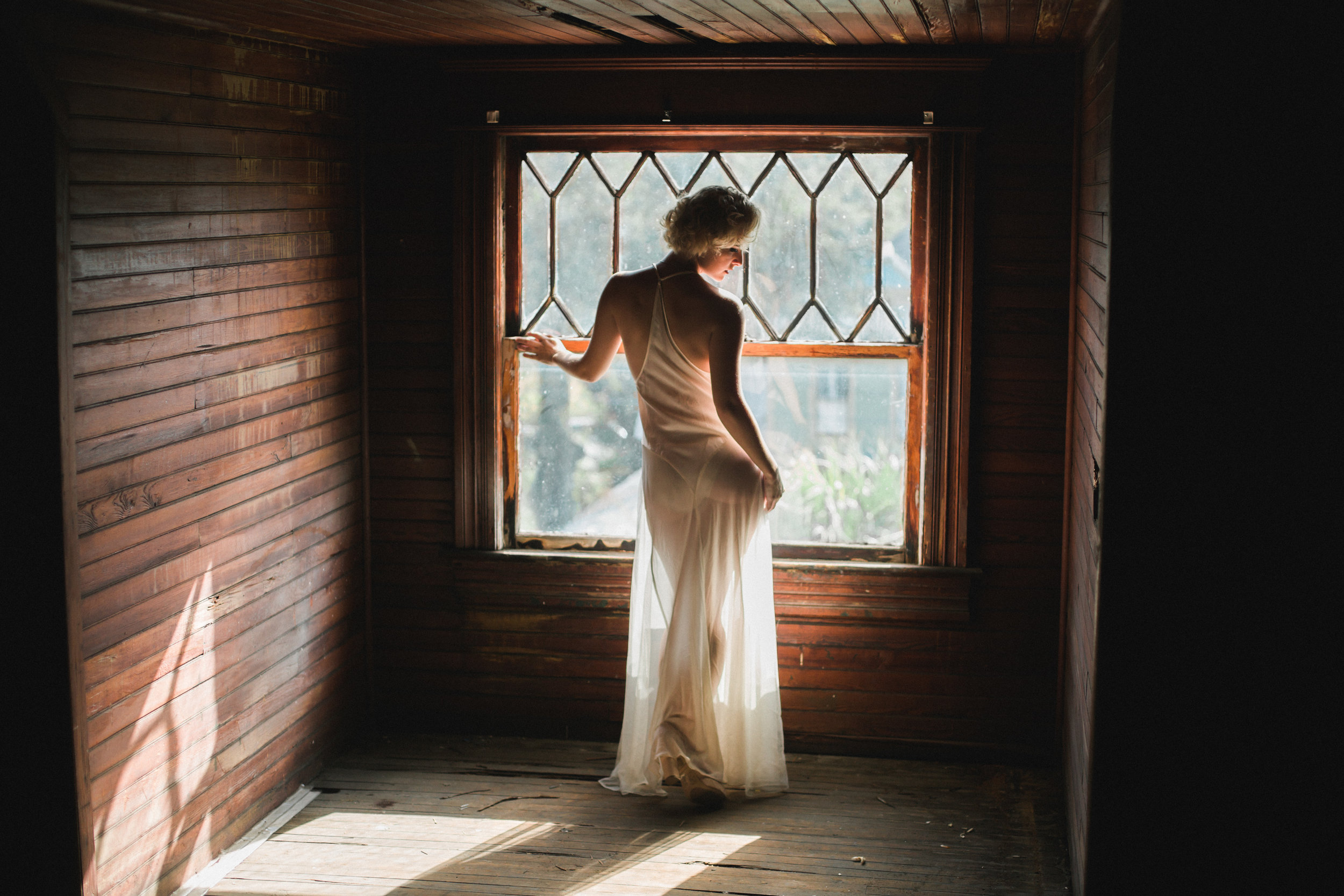 Boudoir Attic Session Hardwood Shadows Sunlight