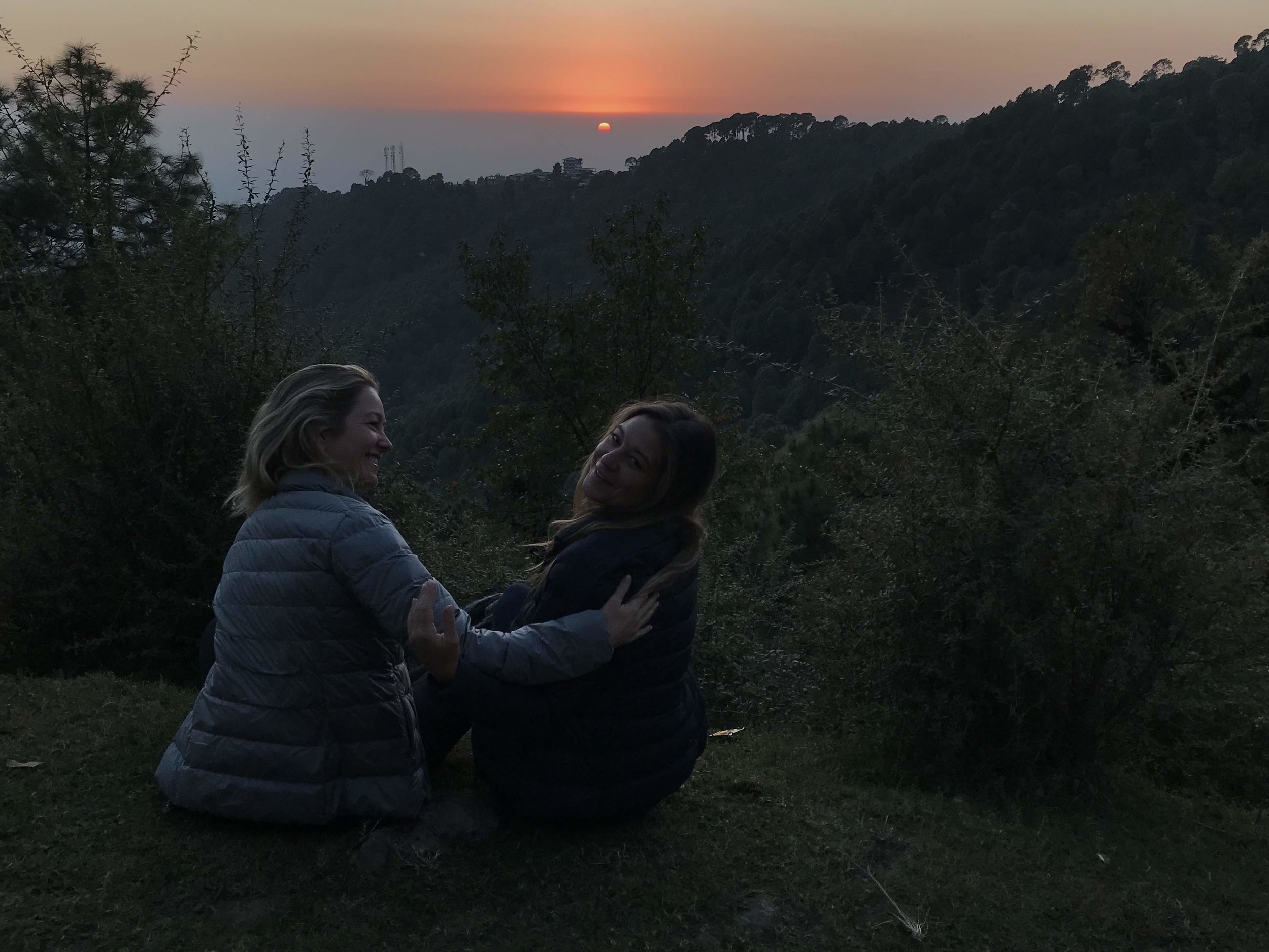 Our friends Tara and Mica enjoying the sunset over the Himalayan foothills