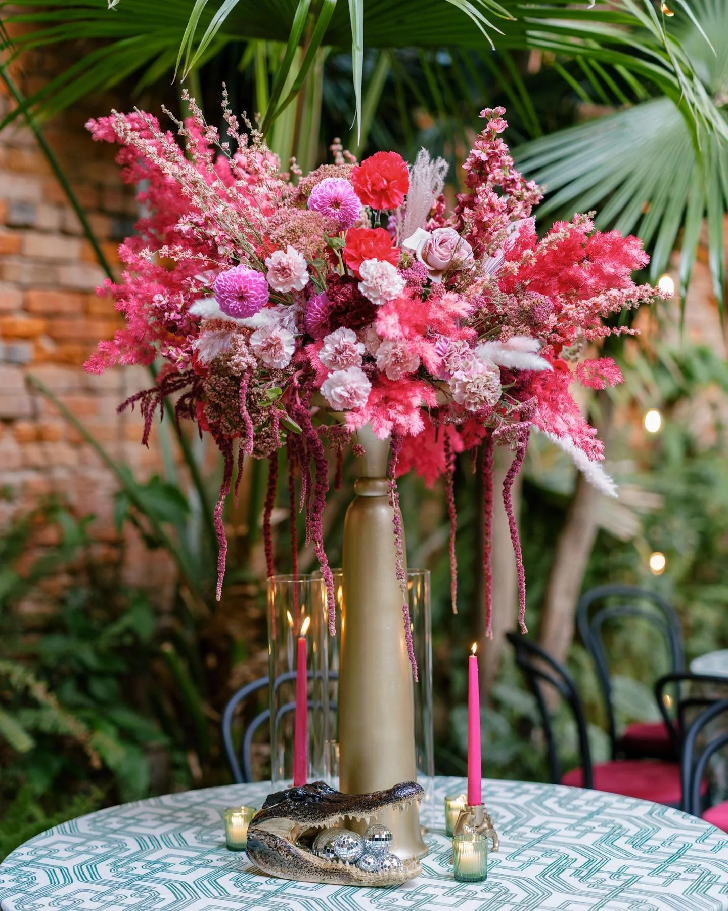 A pink-forward palette, disco ball details, and yes, mirrorball gator centerpieces (!!) will surely take your courtyard dinner to the next level. ⁠I love when clients let us go all the way with the fun. Let&rsquo;s do something exciting for your next