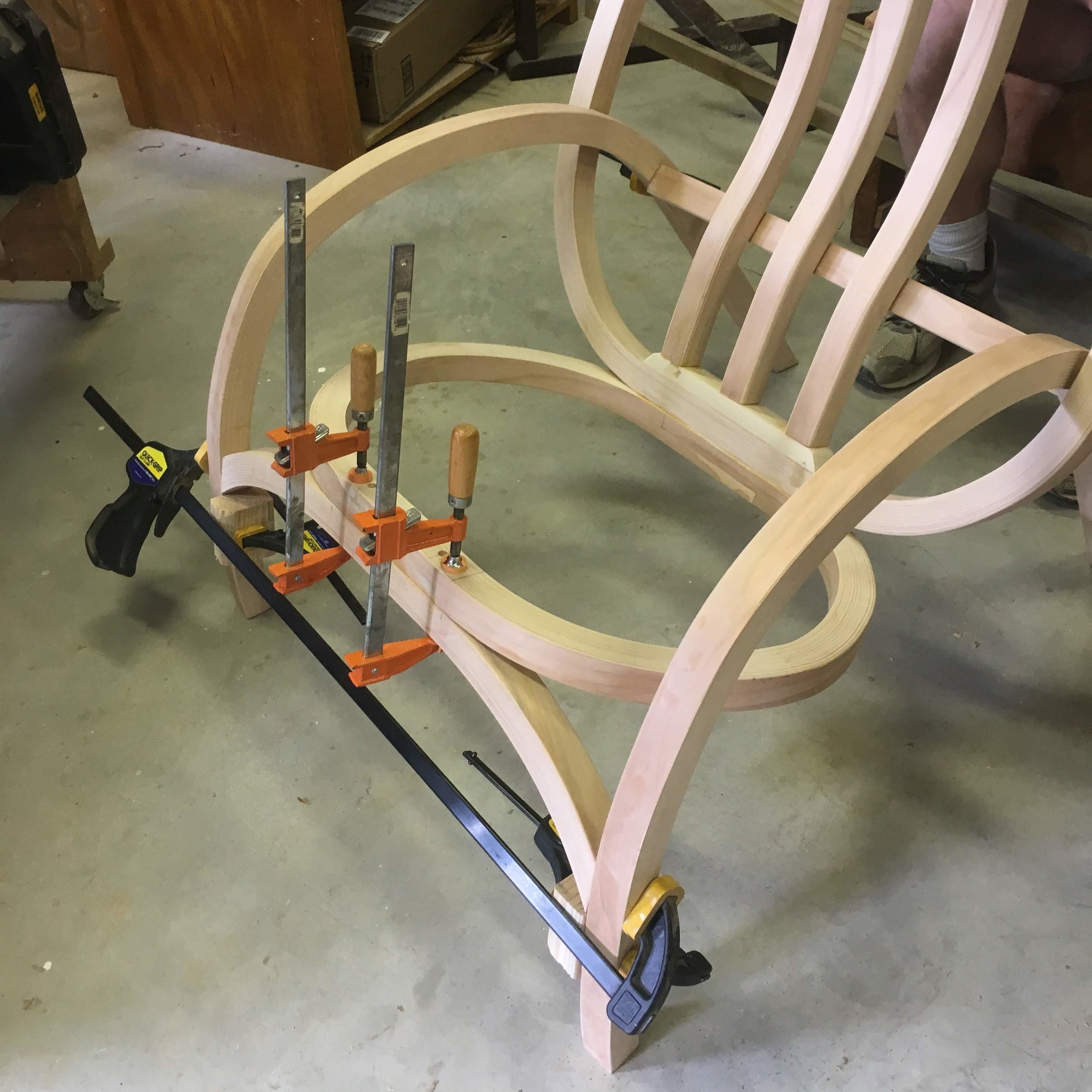  legs and supports are attached to fit in the frame of the back 