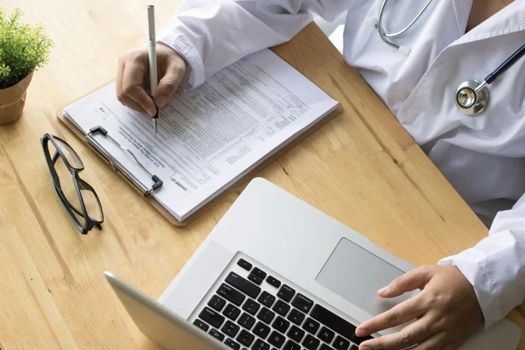 Physician doing paperwork
