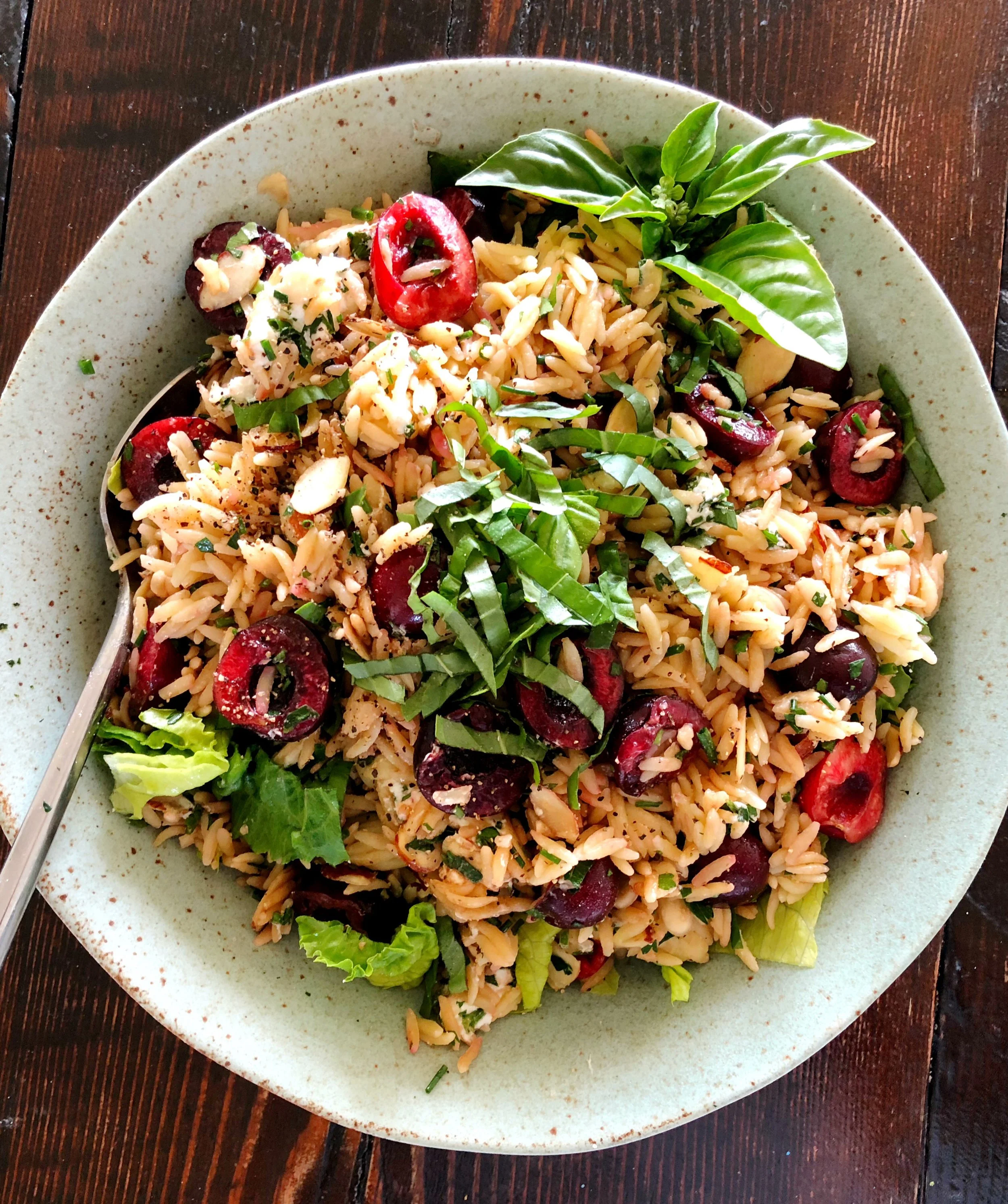 Orzo Pasta Salad with Cherries, Almonds, Goat Cheese and Greens