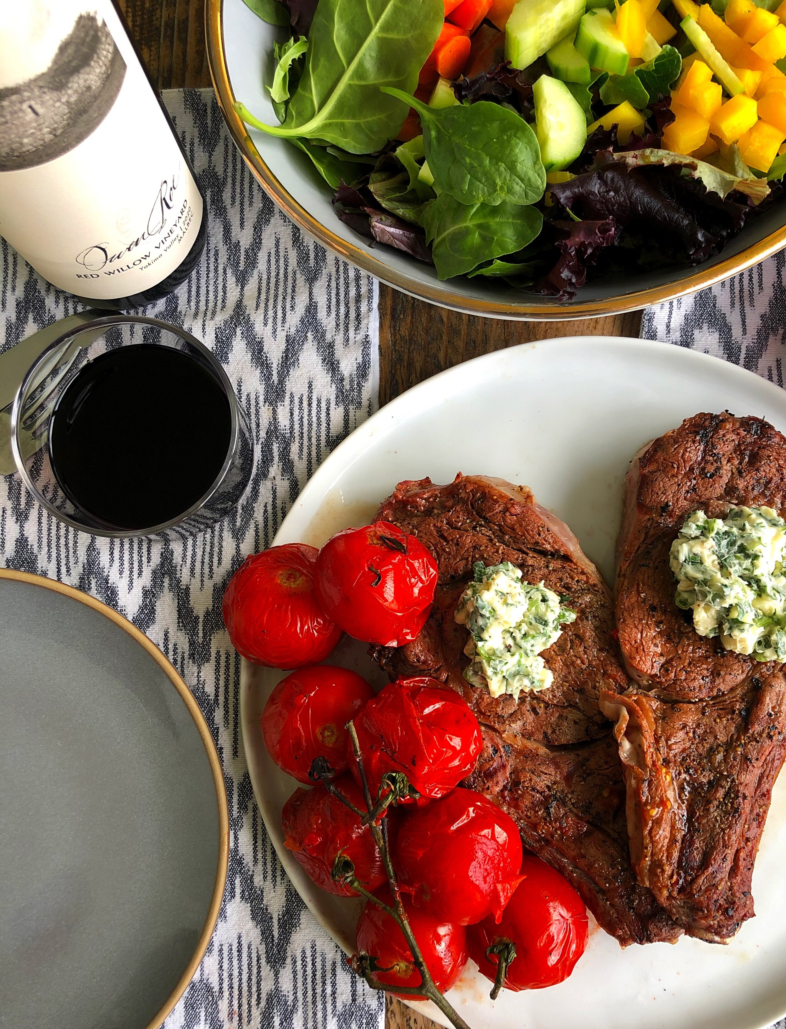 Black and Blue Ribeyes with Blistered Tomatoes