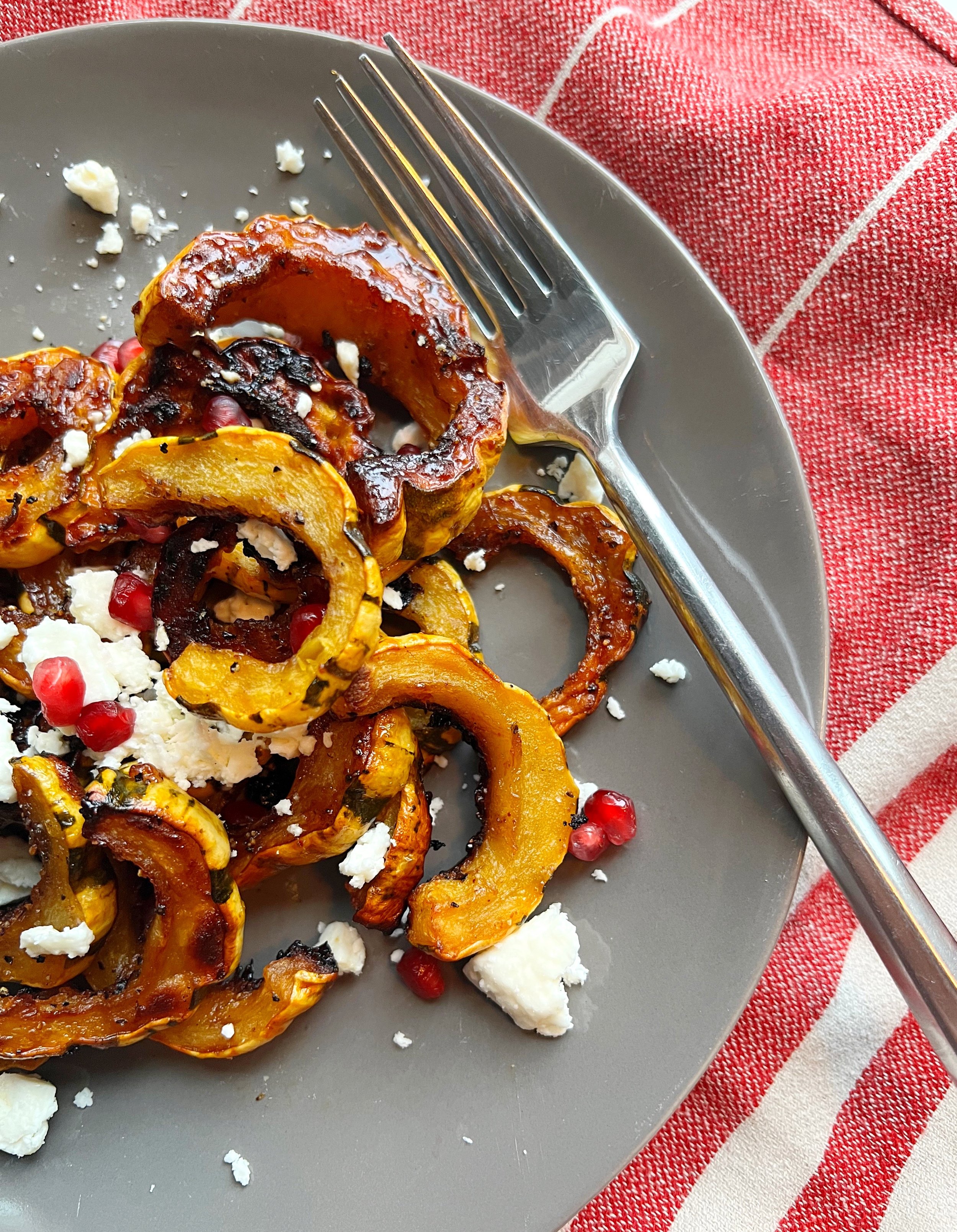 Roasted Delicata Squash with Feta and Pomegranate Seeds