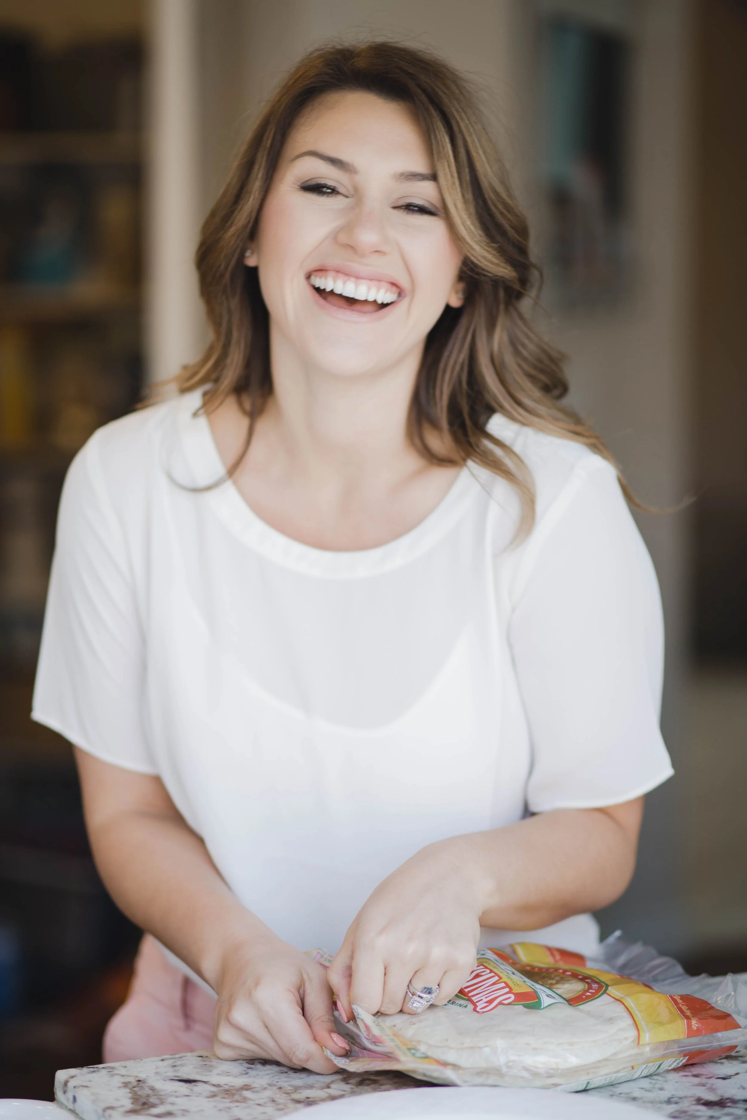 ari smiling with tortillas.jpg