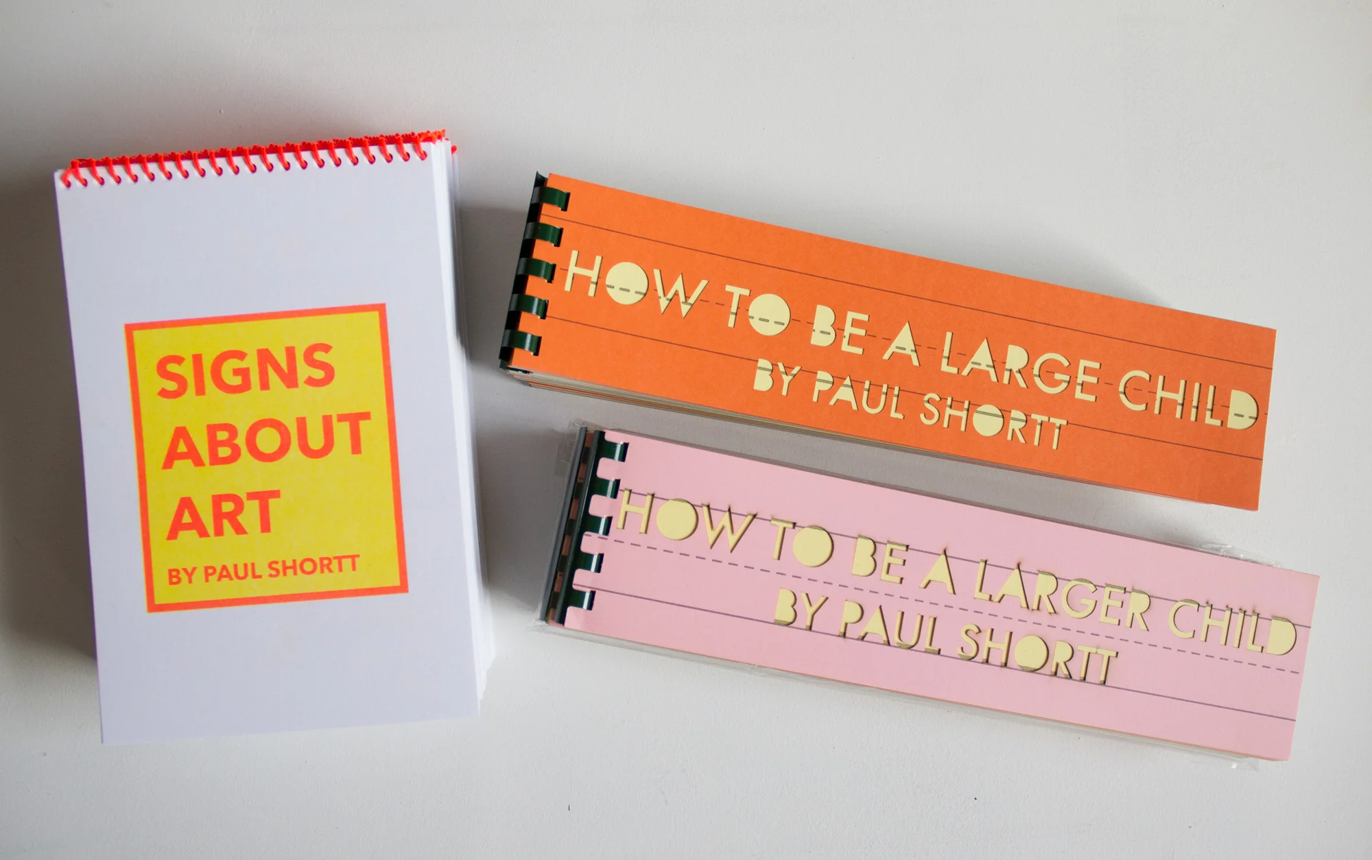 Signs About Art, How to be a Large Child, and How to be a Larger Child