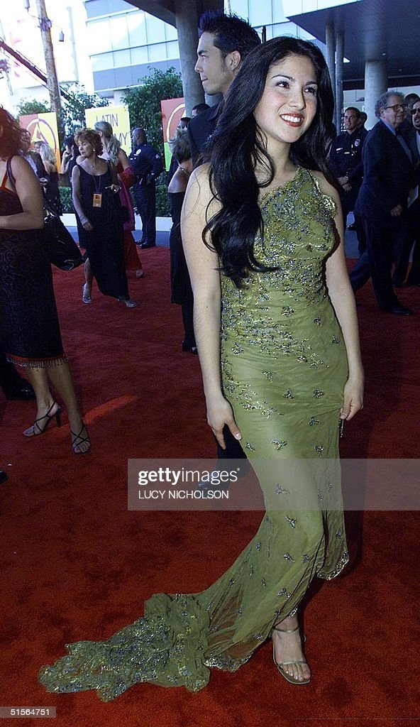  LOS ANGELES, UNITED STATES:  Singer Jaci Velasquez arrives at the first annual Latin Grammy Awards at the Staples Center in Los Angeles 13 September, 2000.  AFP PHOTO/Lucy NICHOLSON (Photo credit should read LUCY NICHOLSON/AFP via Getty Images) 