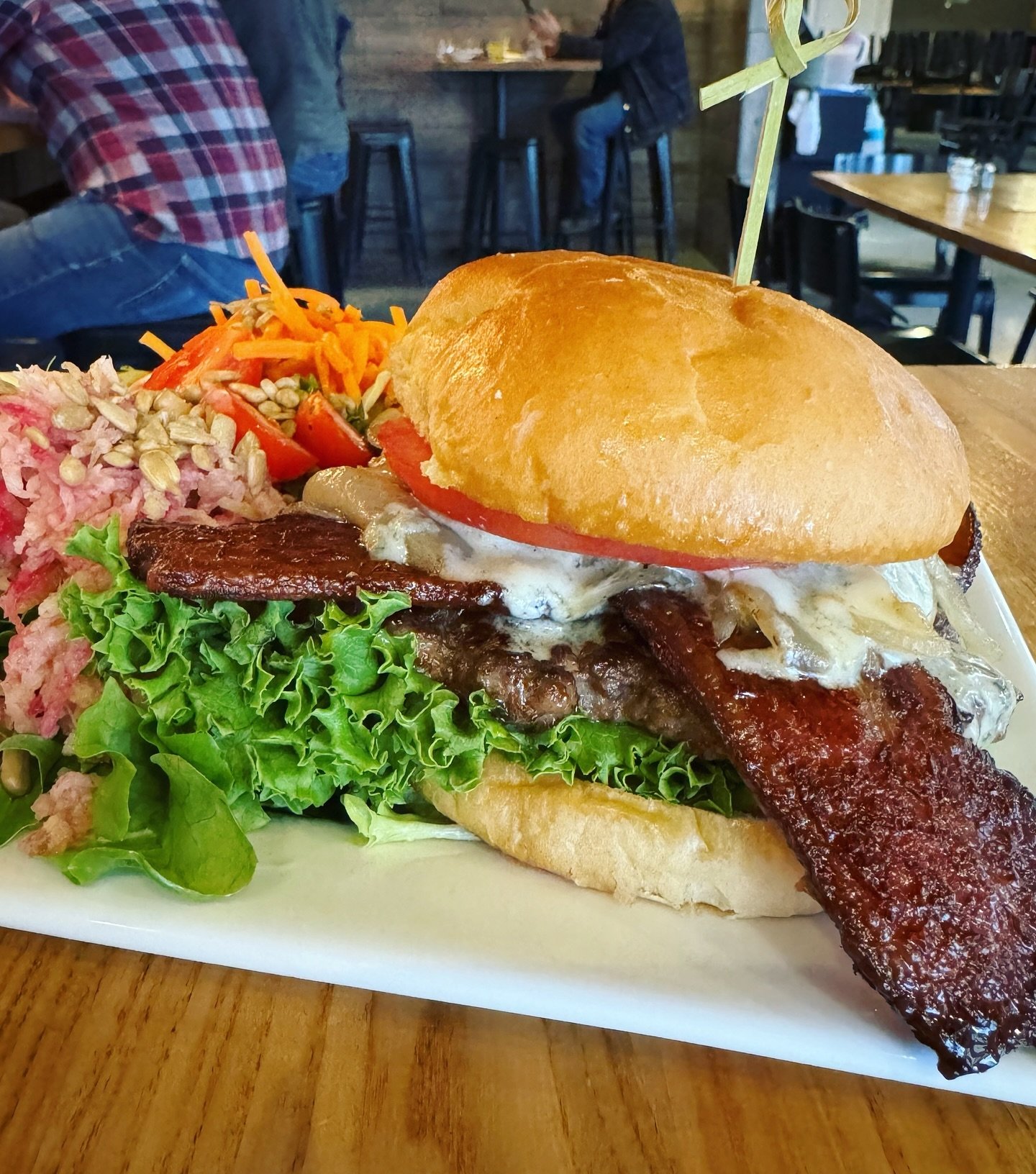 We aren&rsquo;t messing around with this burger 👀 Boys in Blue is a popular new addition to the 2024 menu. Upgrade your side or enjoy with potato chips.