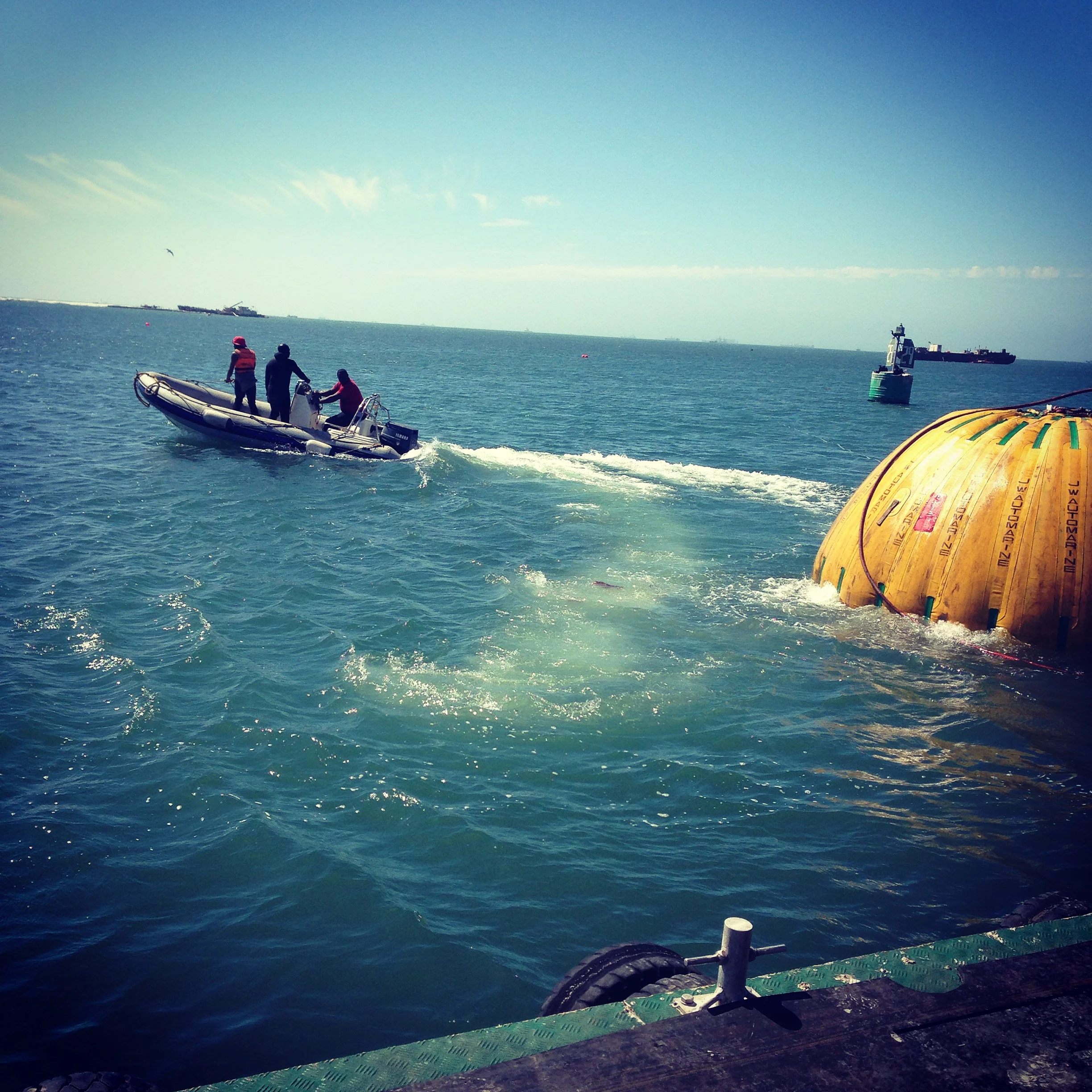 5 Towing the blocks to the quay side.JPG