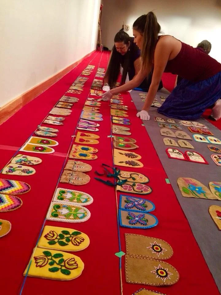 Volunteering to help set up the Walking With Our Sister art exhibit at Wanuskewin Park – Saskatoon, SK. This exhibit displays moccasin vamps that represent the thousands of missing and murdered Indigenous women across Canada.