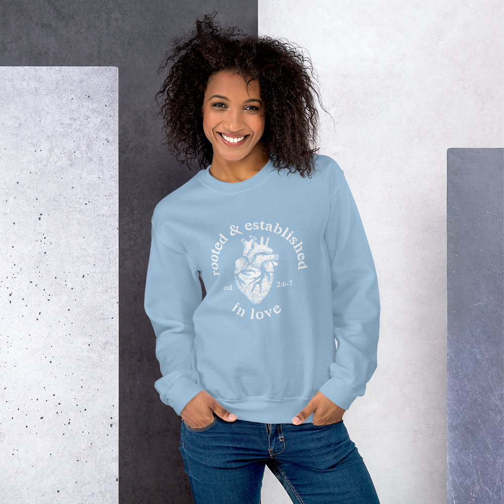 Rooted-Final-Front-W_YX-Logo-W_printfile_front_Rooted-Final-Front-W_YX-Logo_mockup_Front_Womens-Lifestyle-2_Light-Blue.png