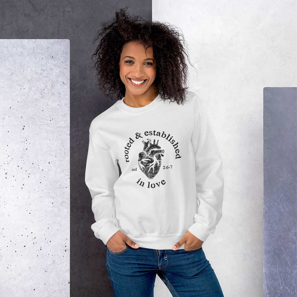 Rooted-Final-Front_YX-Logo-B_printfile_front_Rooted-Final-Front_YX-Logo-B_p_mockup_Front_Womens-Lifestyle-2_White.png