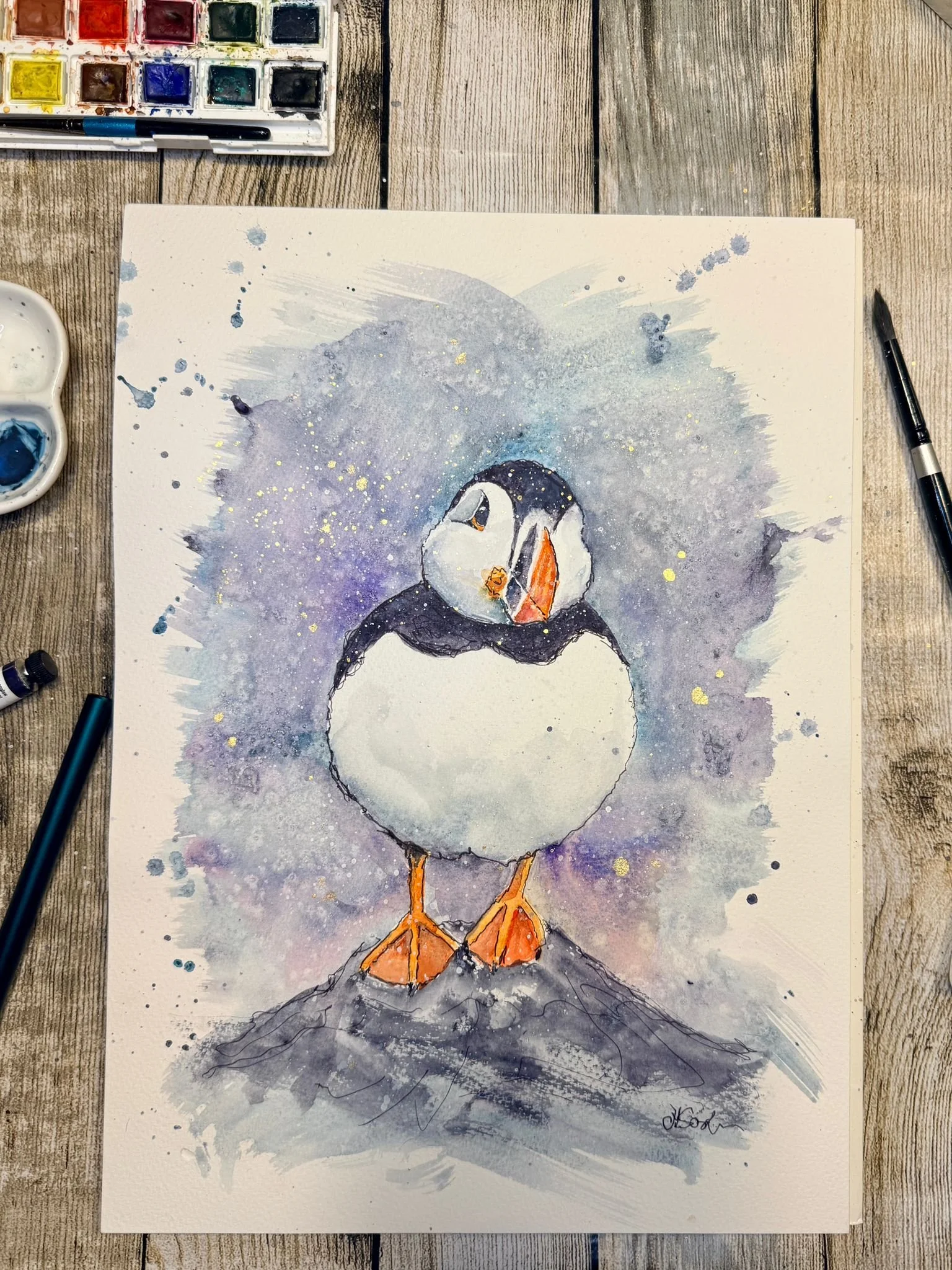 a water colour of a puffin