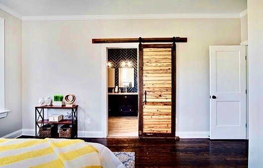 Our passion is making old things new again! 
This barn door was made using the old hardwood and original 2x4s from this 1916 home! 
We also used the original, full-sized 2x4s in the beam work in the dining room and kitchen! 
#masterimprovementsrva #c