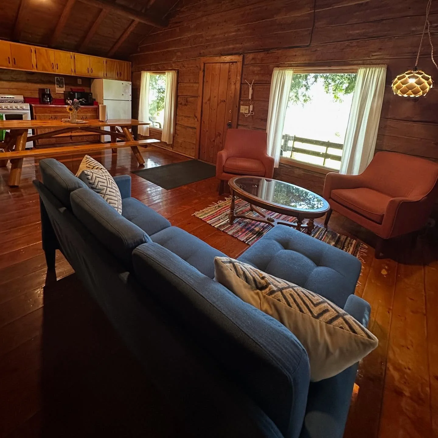 Cozy cabins with all the comforts of home. Book an autumn visit to the Upper Peninsula. manninenscabins.com #yksicabin #cozycabin #sleepssix #otterlakelife #manninenscabins