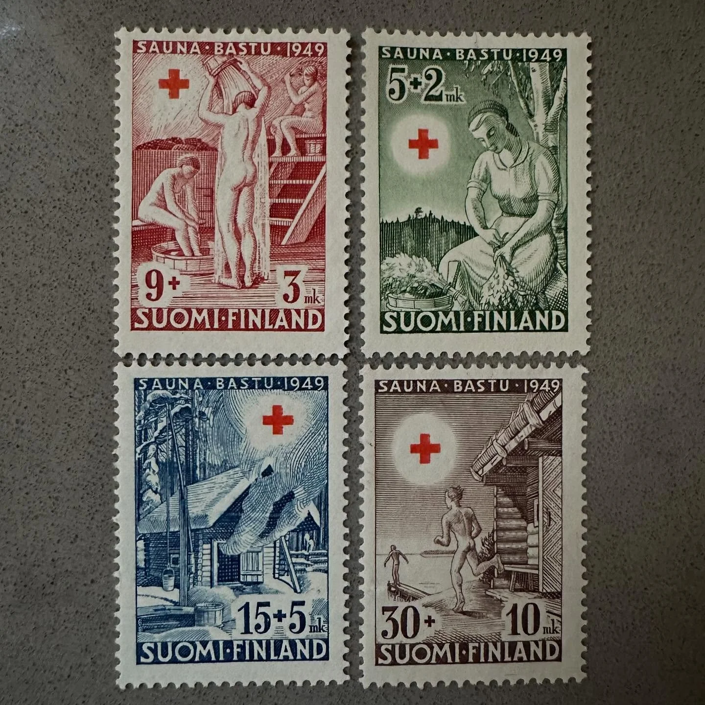 Each stamp is a tiny, beautiful piece of art. Stamps tell stories on today&rsquo;s yoopercabingrl blog: manninenscabins.com/cabin-blog/2025/11/03/stamps-tell-stories #stamps #stampstellstories #saunastamp #yoopercabingrlblog #yoopercabingrl #michigan