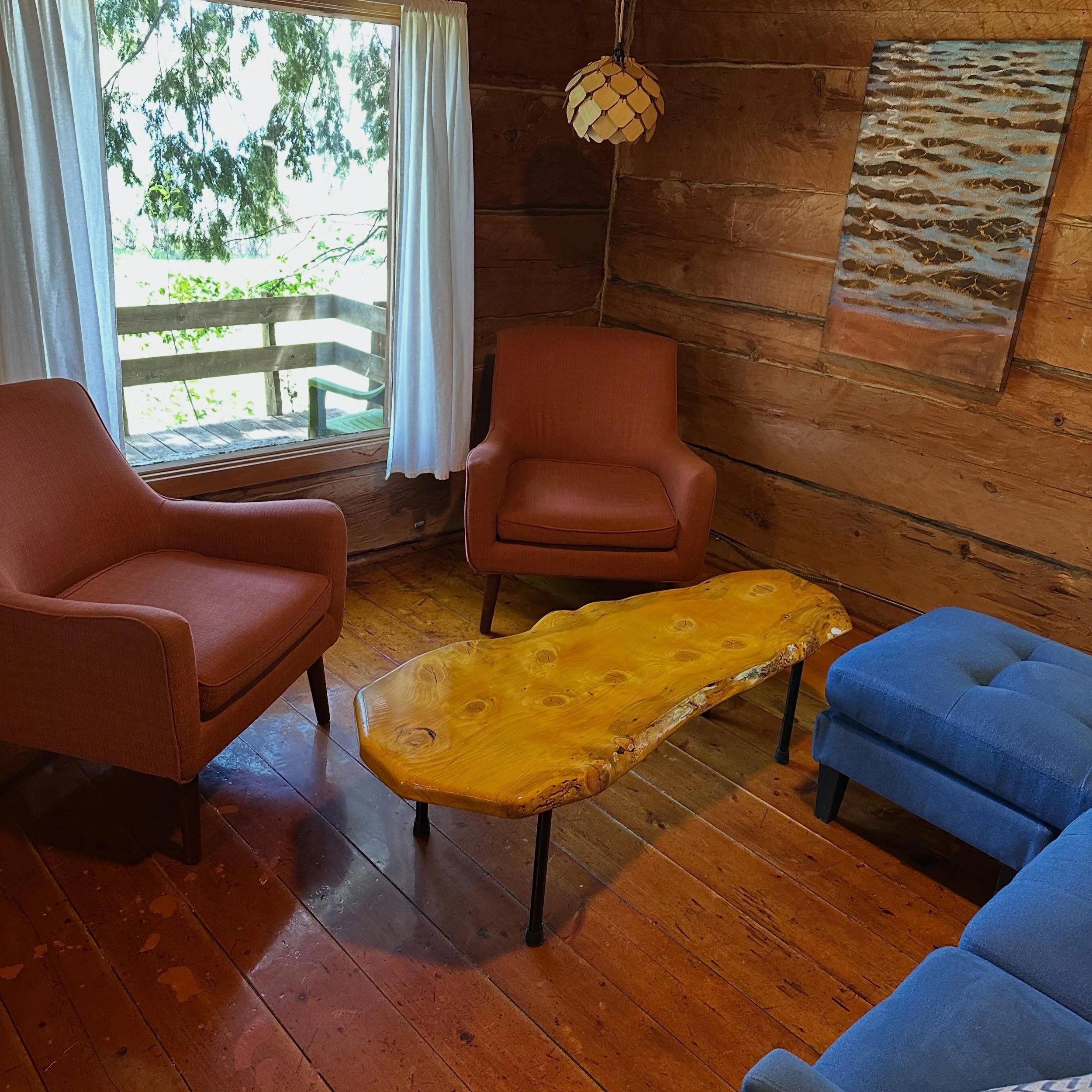 New coffee table and art for the Yksi (No. 1) cabin. manninenscabins.com #yksicabin #otterlakelife #manninenscabins